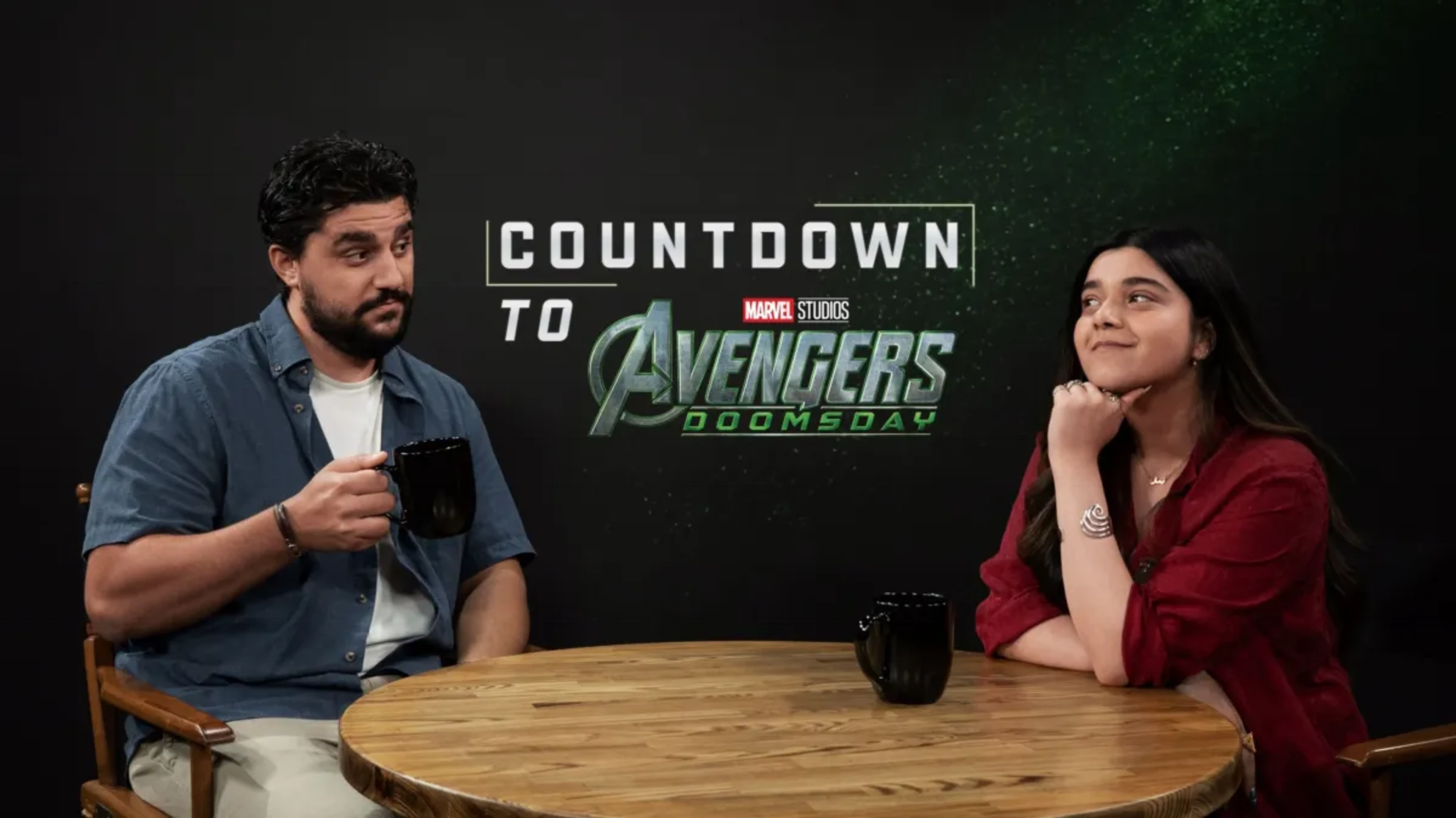 Iman Vellani and Frank Alvarez host the Countdown to Avengers: Doomsday podcast at a table.