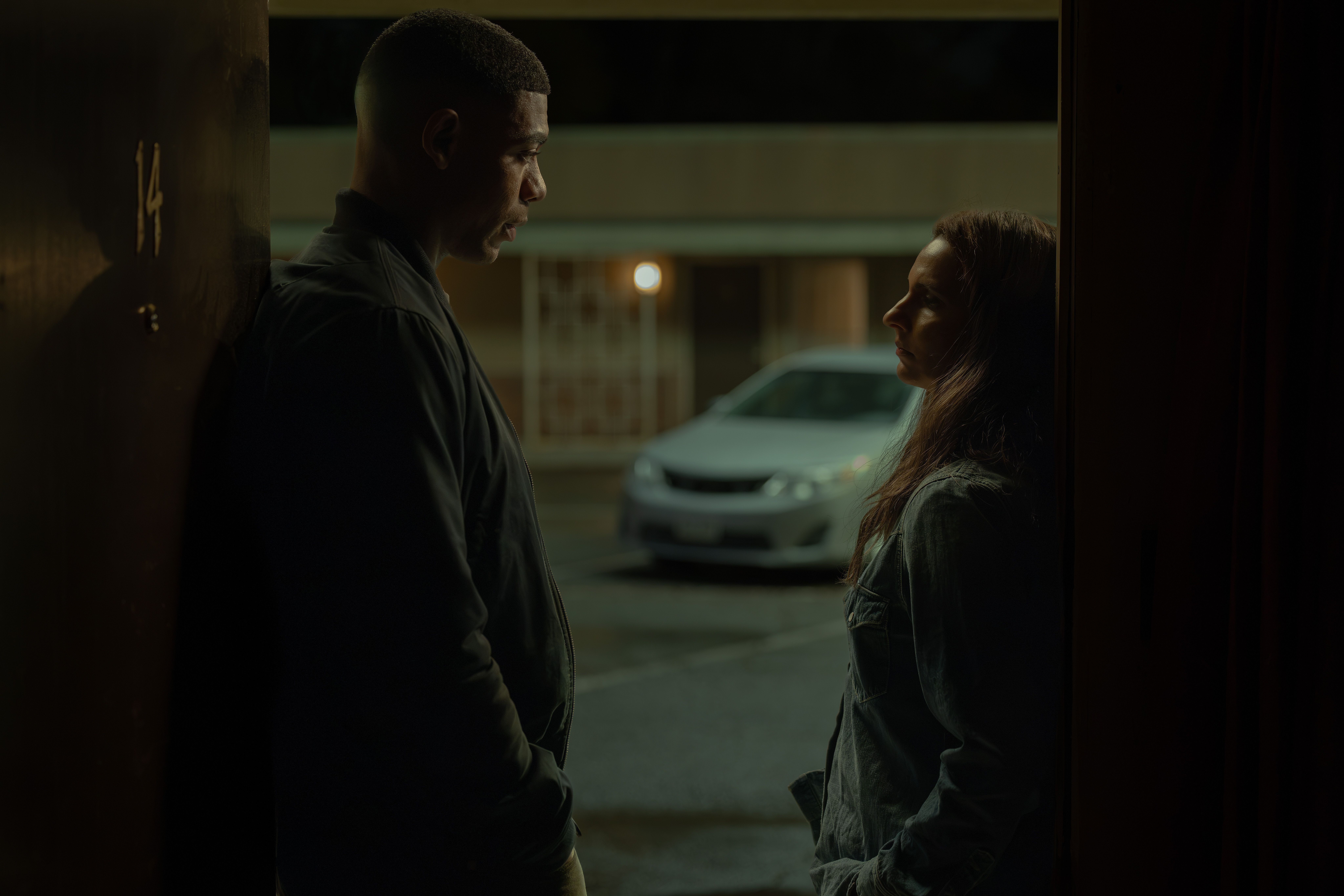 Aaron Pierre as John Stewart speaks with a key witness in Lanterns.