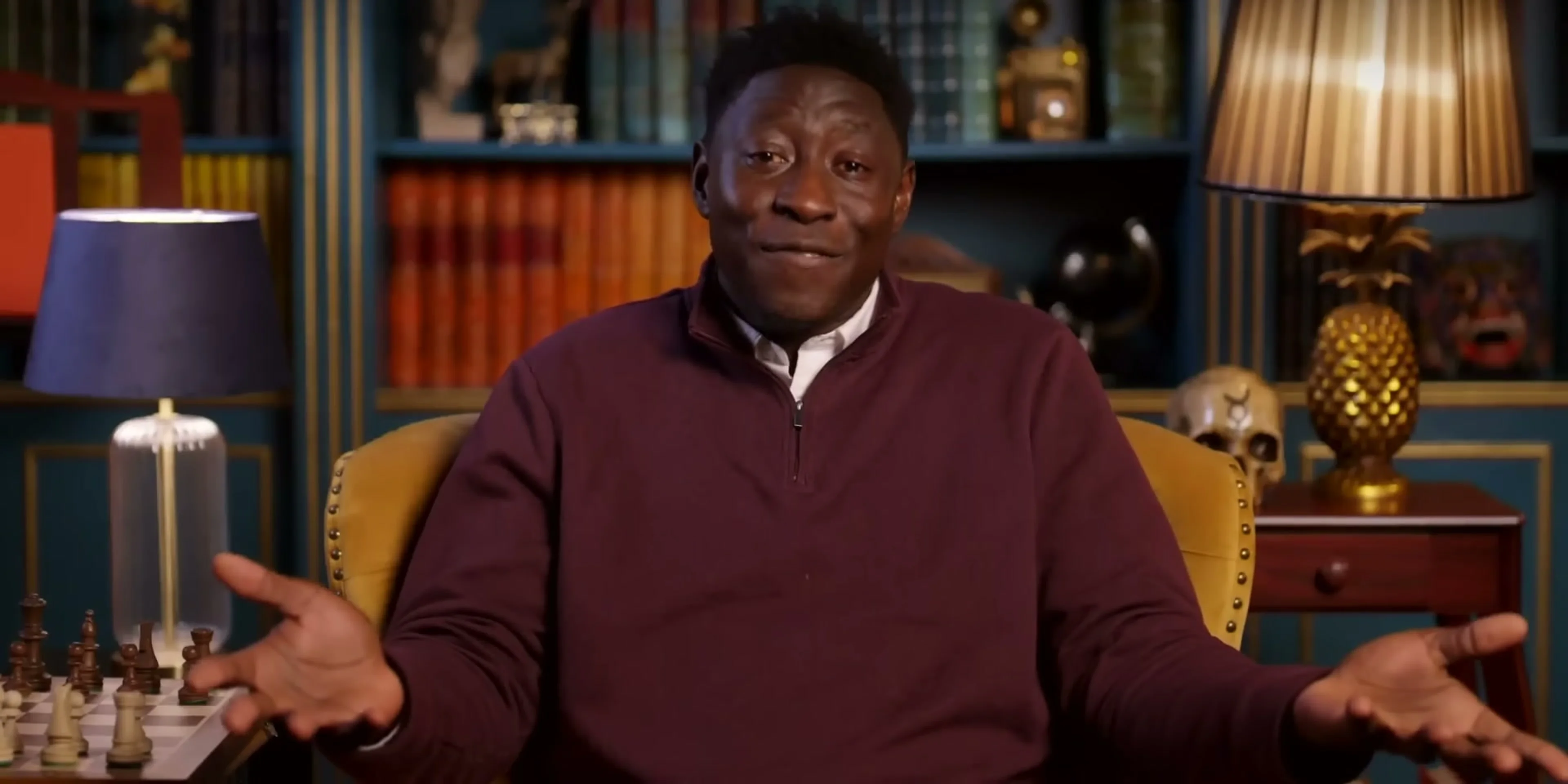 A contestant speaks from an armchair in The Traitors: New Blood trailer.