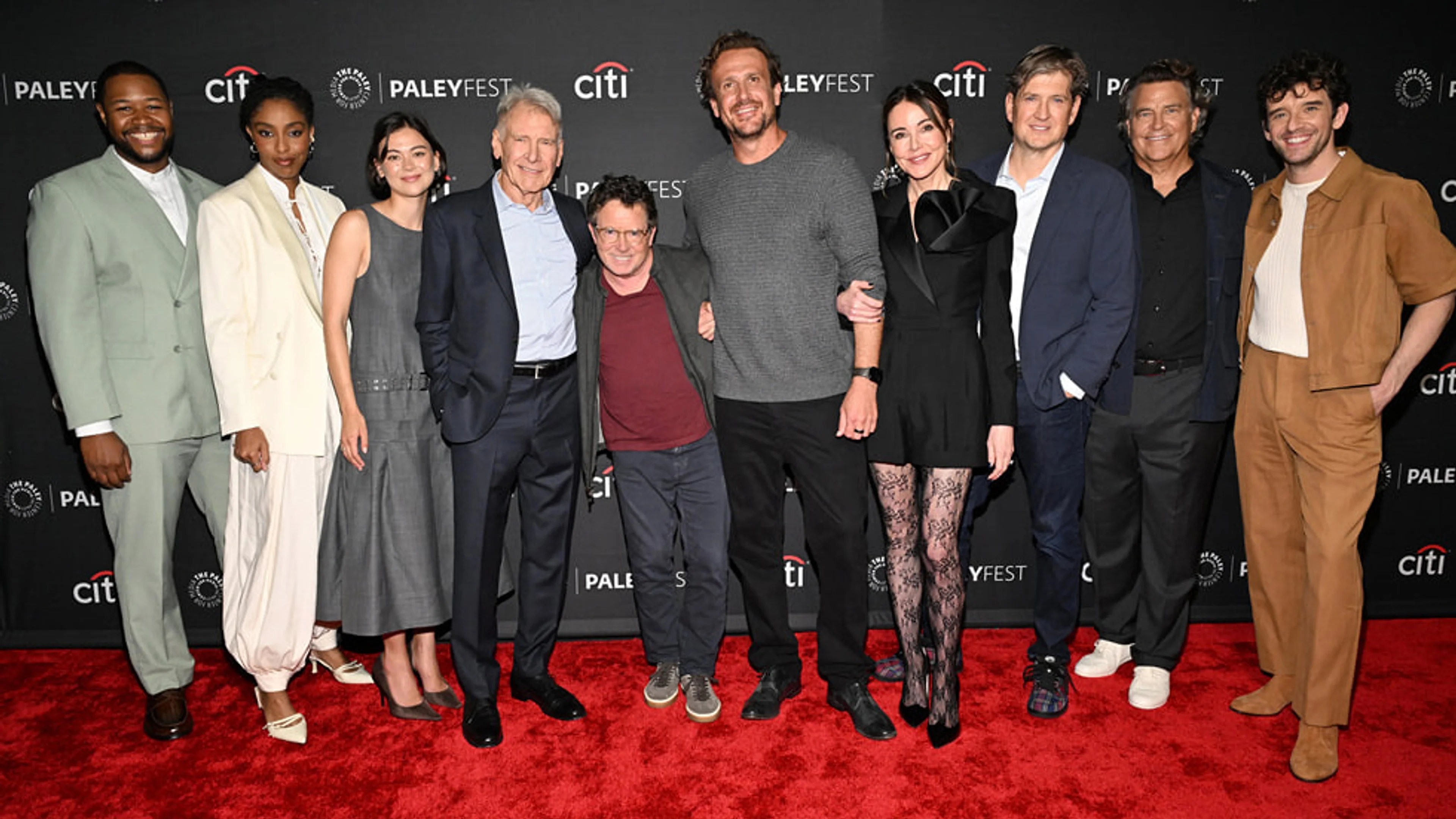 Harrison Ford stands with the Shrinking Season 3 cast and creators at PaleyFest LA.