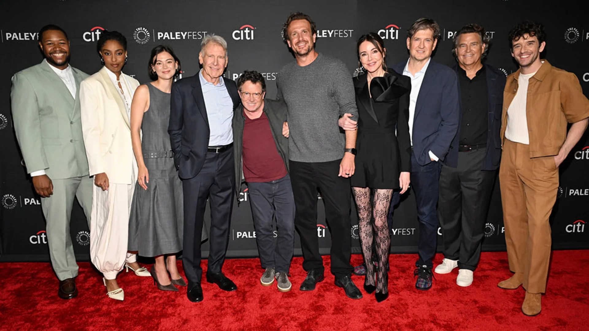 Harrison Ford stands with the Shrinking Season 3 cast and creators at PaleyFest LA.