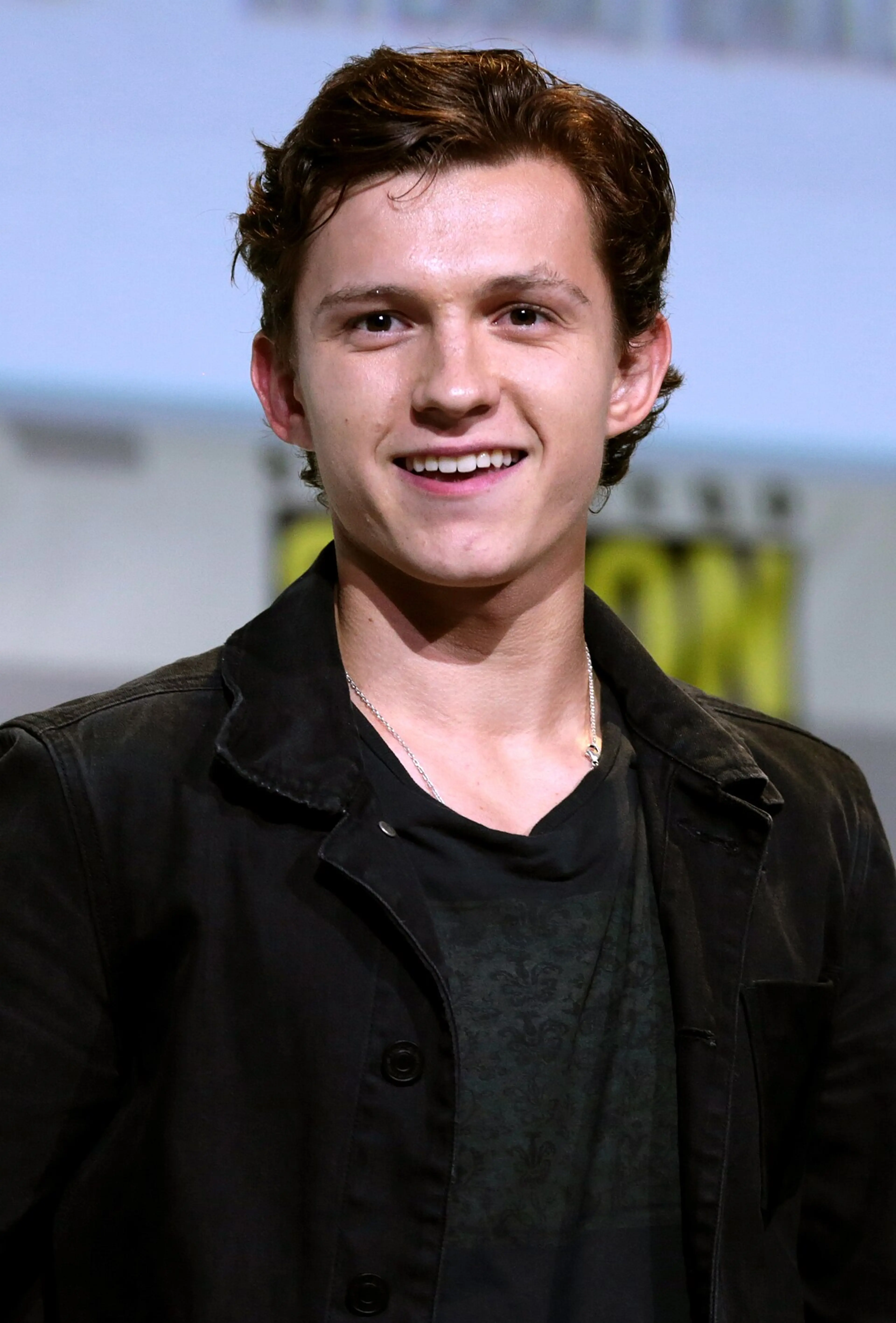 Tom Holland at a public event in an archival portrait.