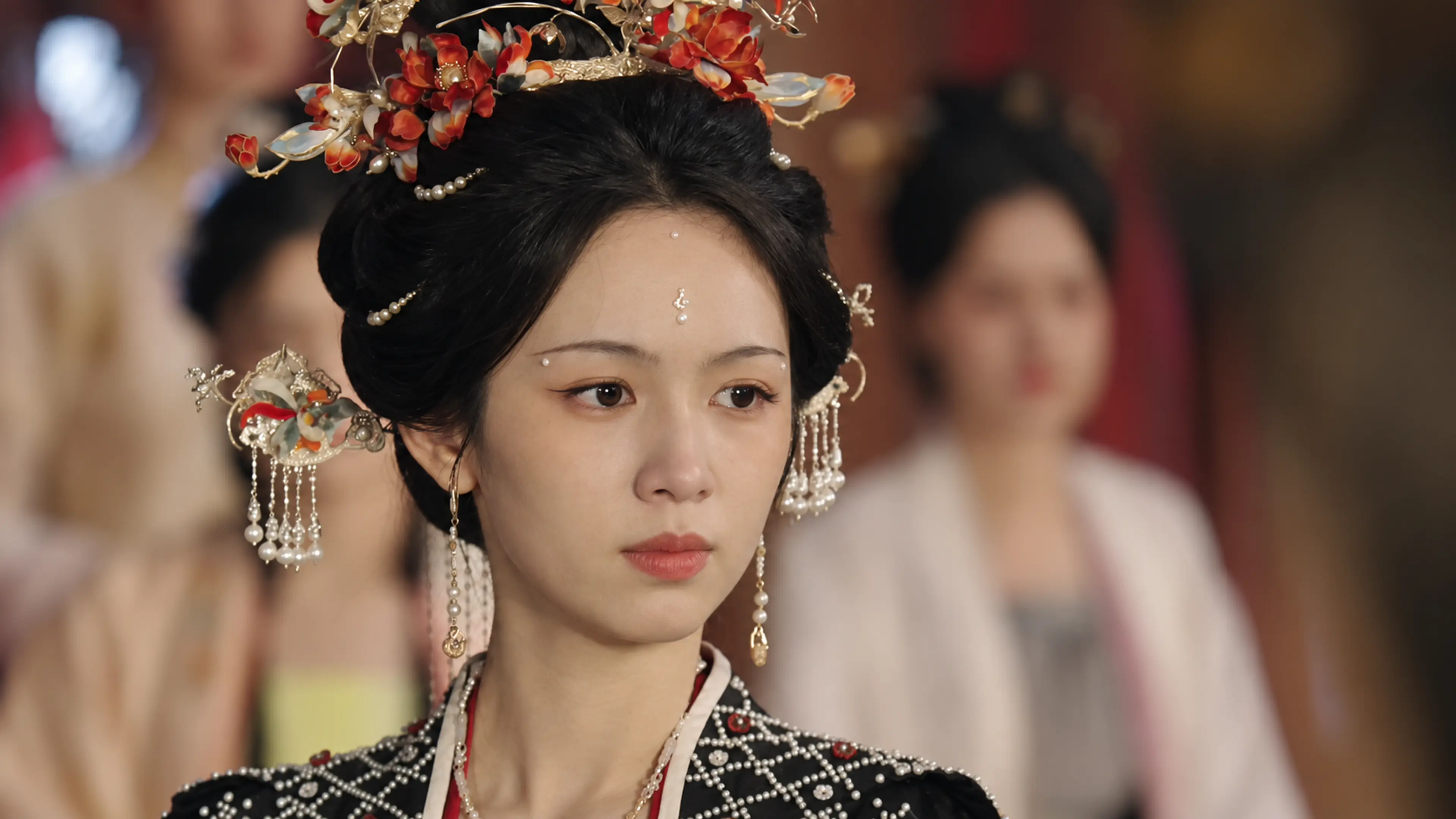 Zhou Ye as Xie Qingyuan wearing an ornate hairpiece in Spring of the Blade.