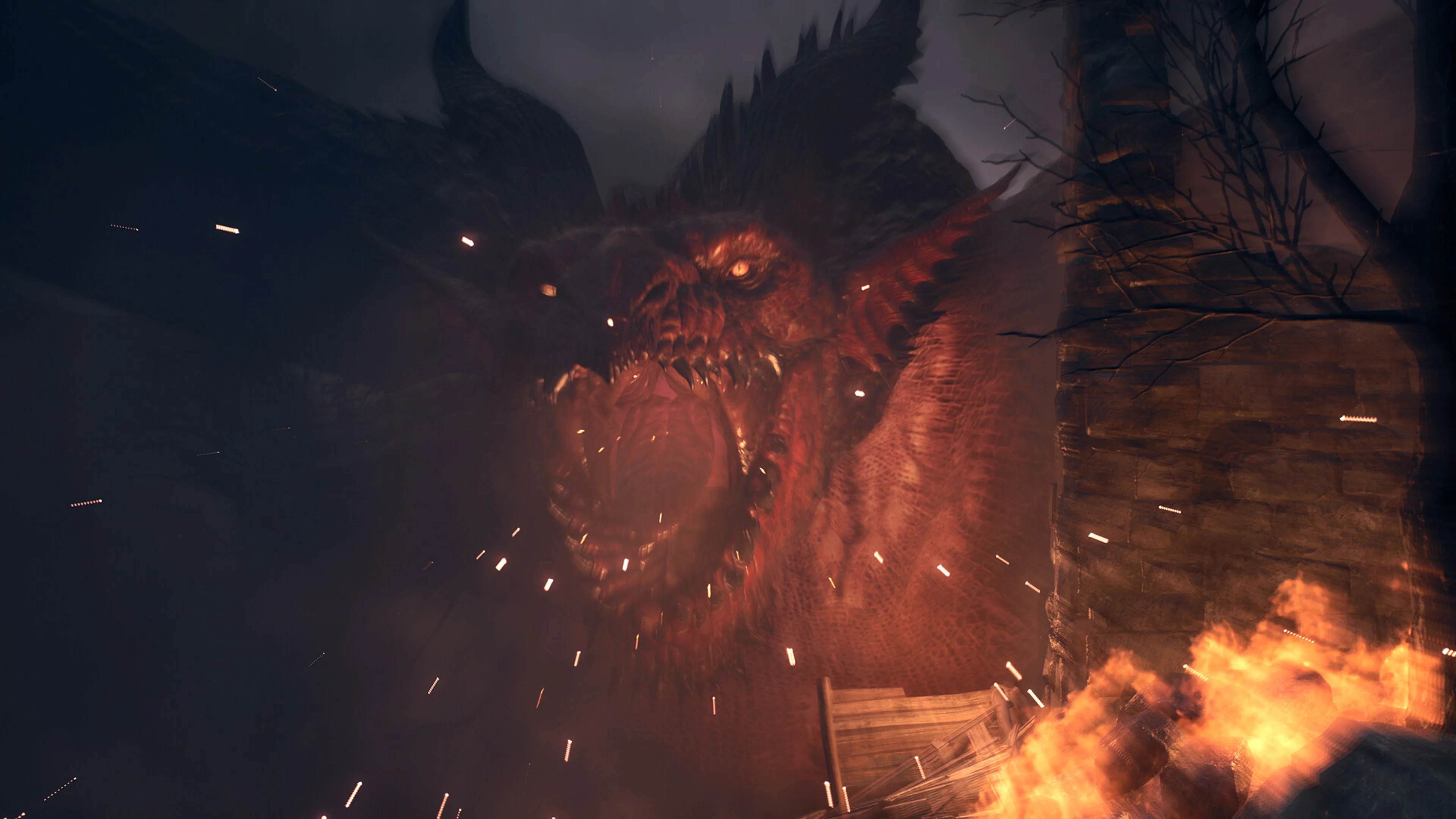 A dragon breathes fire at the party during a night battle in Dragon's Dogma 2.