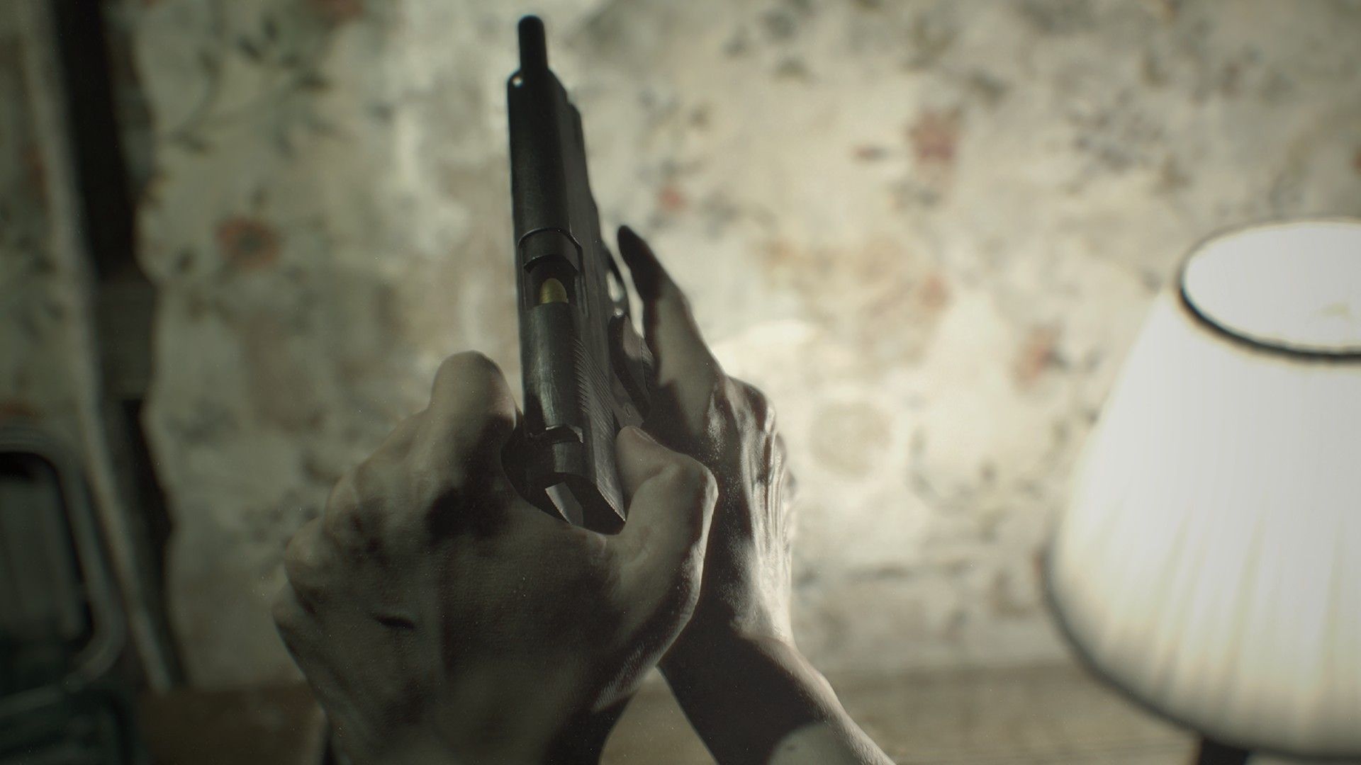 Ethan holds a handgun in a first-person view of a worn room.