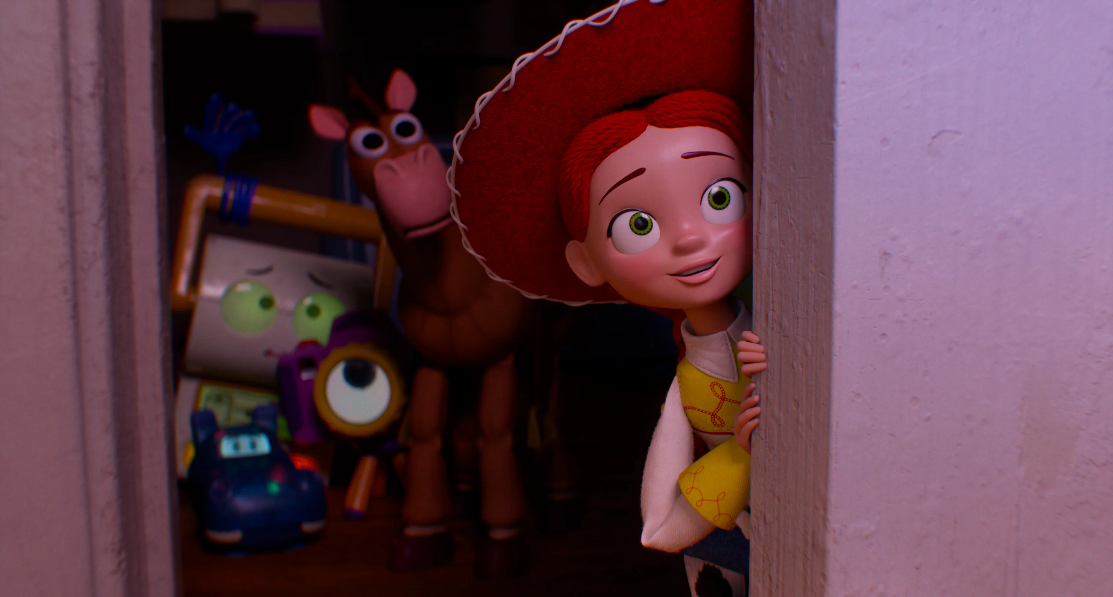 Jessie and other toys look through a doorway in an official Toy Story 5 image.