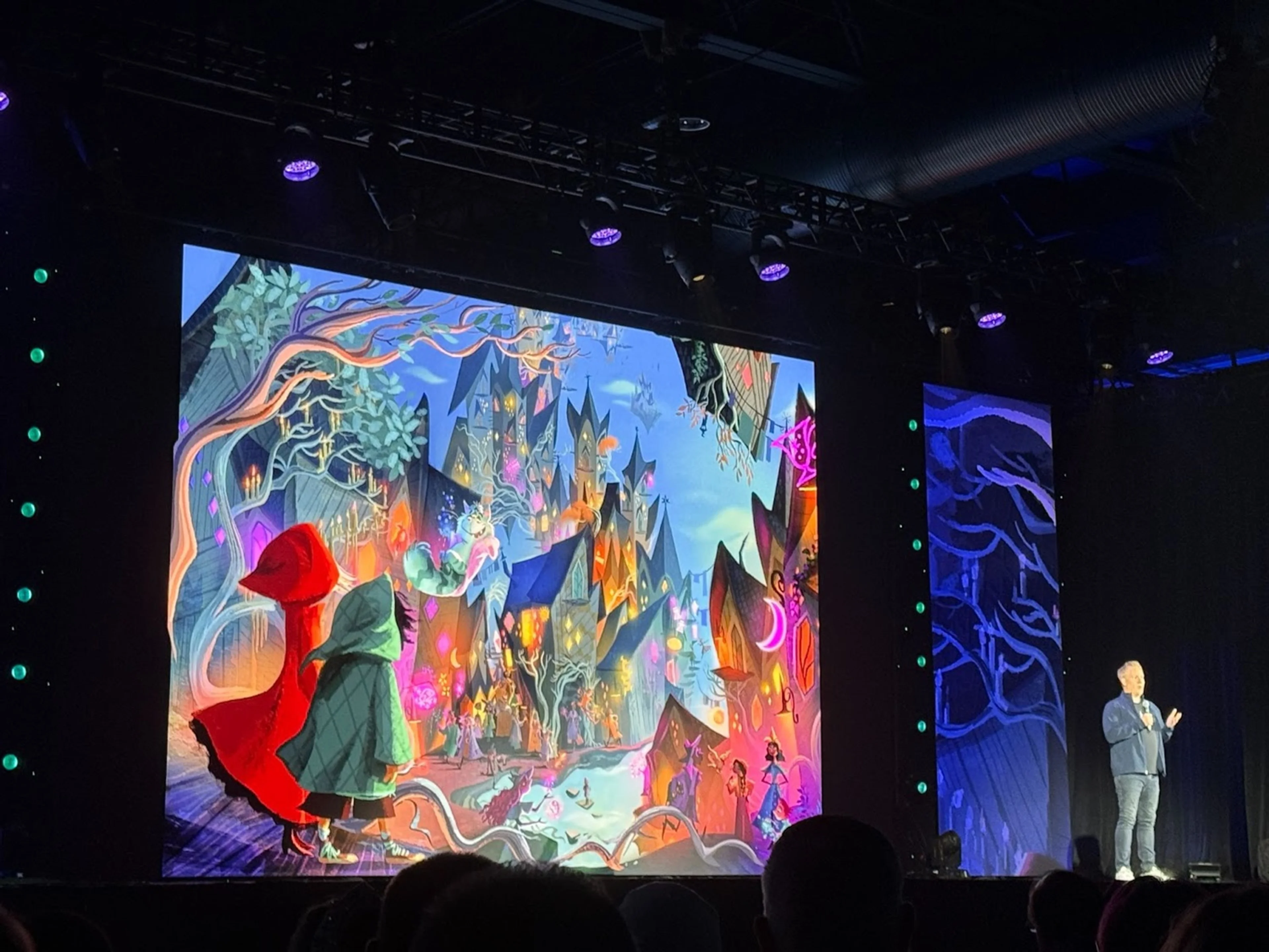 Jared Bush presents Disney Animation concept art at a D23 showcase.