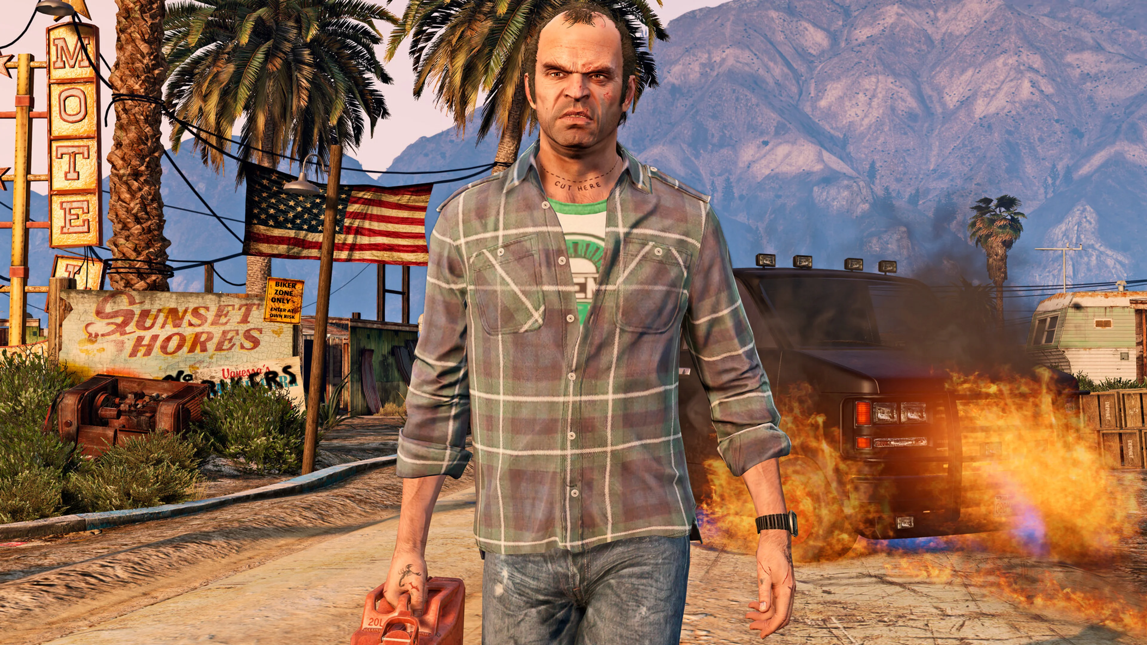 Trevor stands in Sandy Shores in an official GTA 5 screenshot.