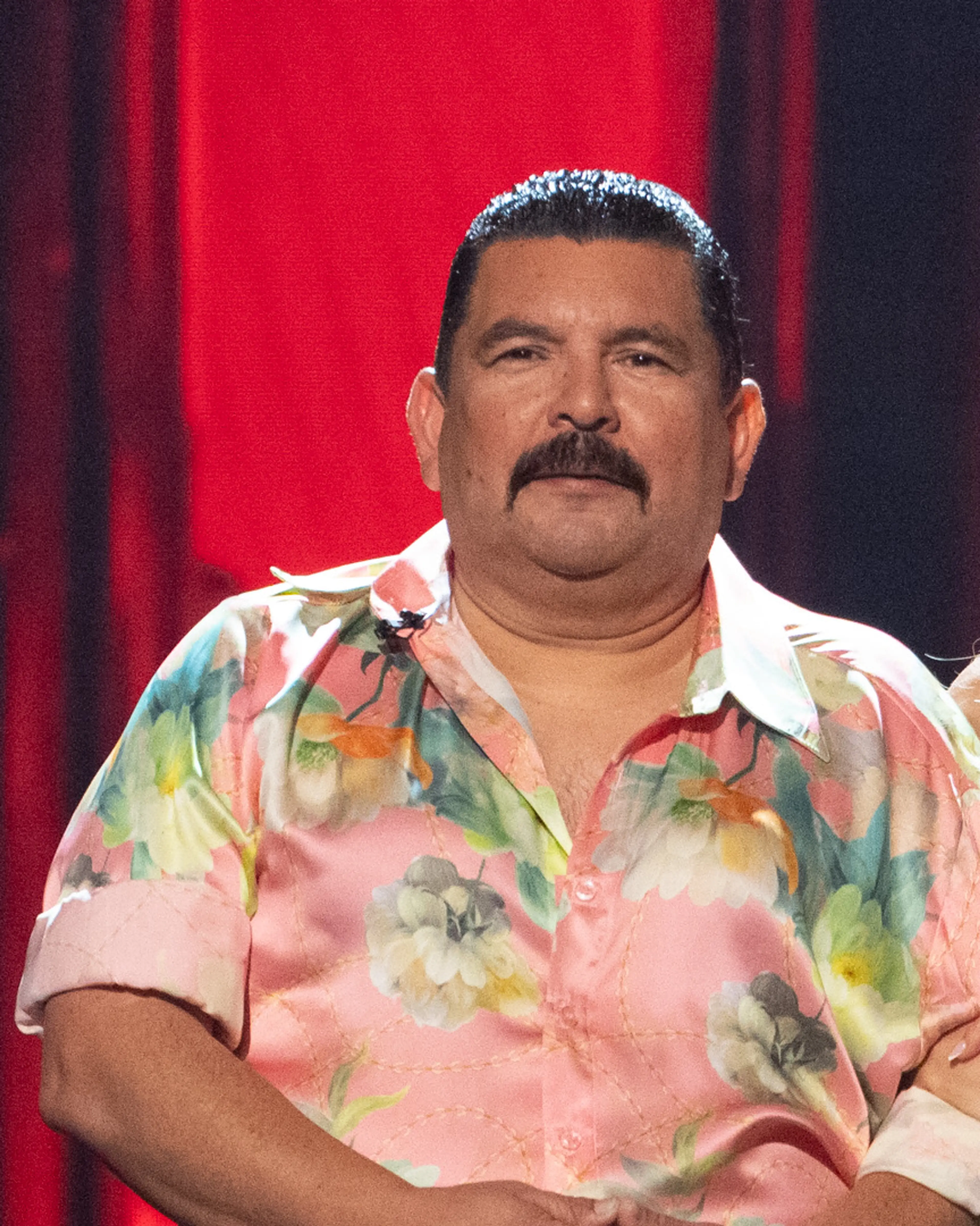 Guillermo Rodriguez and Witney Carson stand together in their Yacht Rock Night outfits.