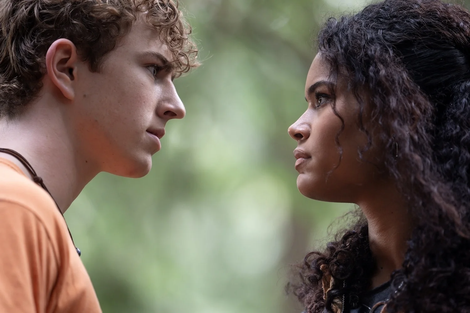 Percy Jackson and Thalia Grace face one another outdoors in Percy Jackson and the Olympians Season 3.