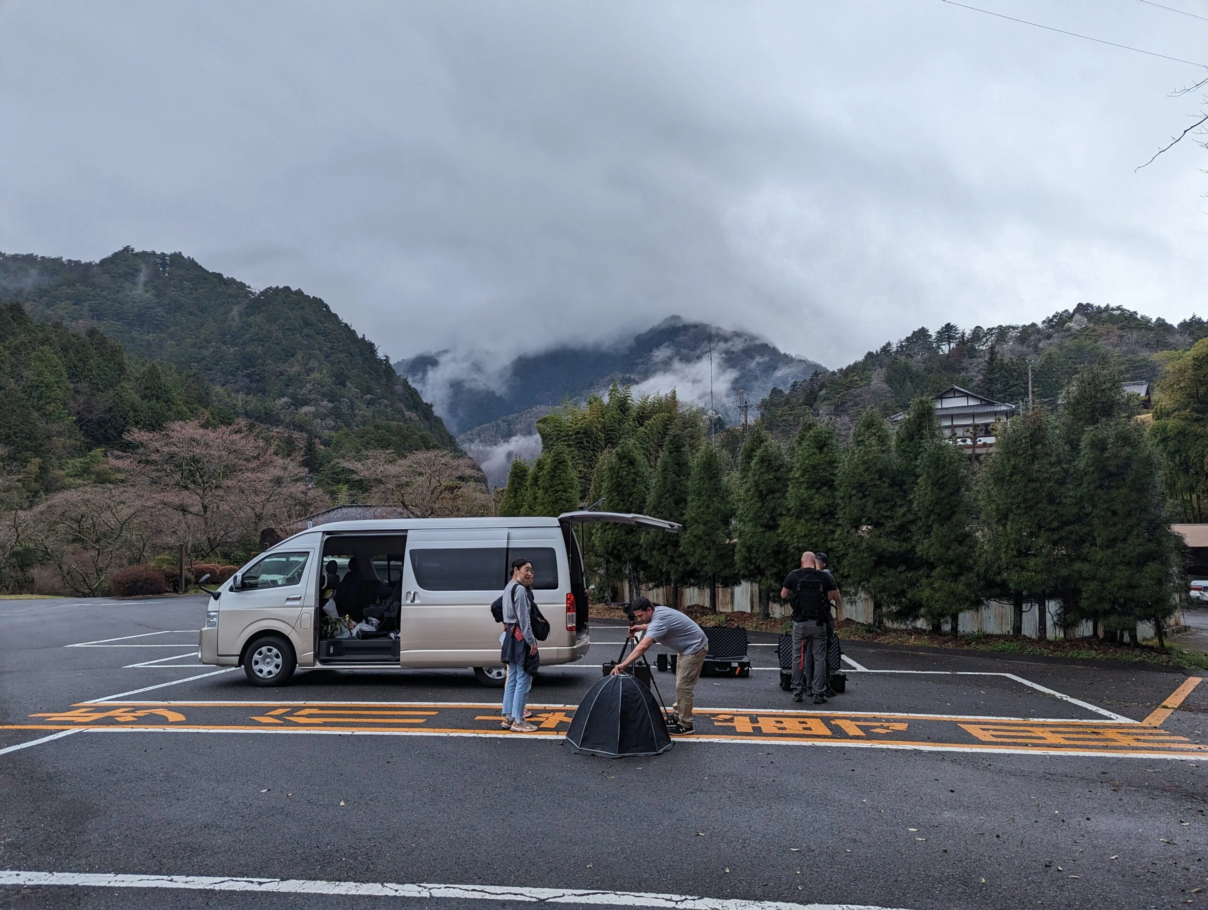Insomniac Games’ scanning crew works near a mountain landscape in Japan during research for Marvel’s Wolverine.