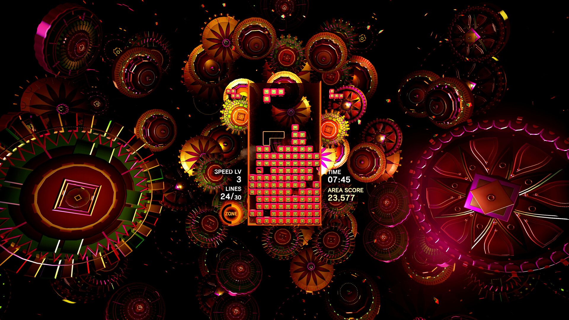 Red and gold mechanical shapes surround the falling-block board.
