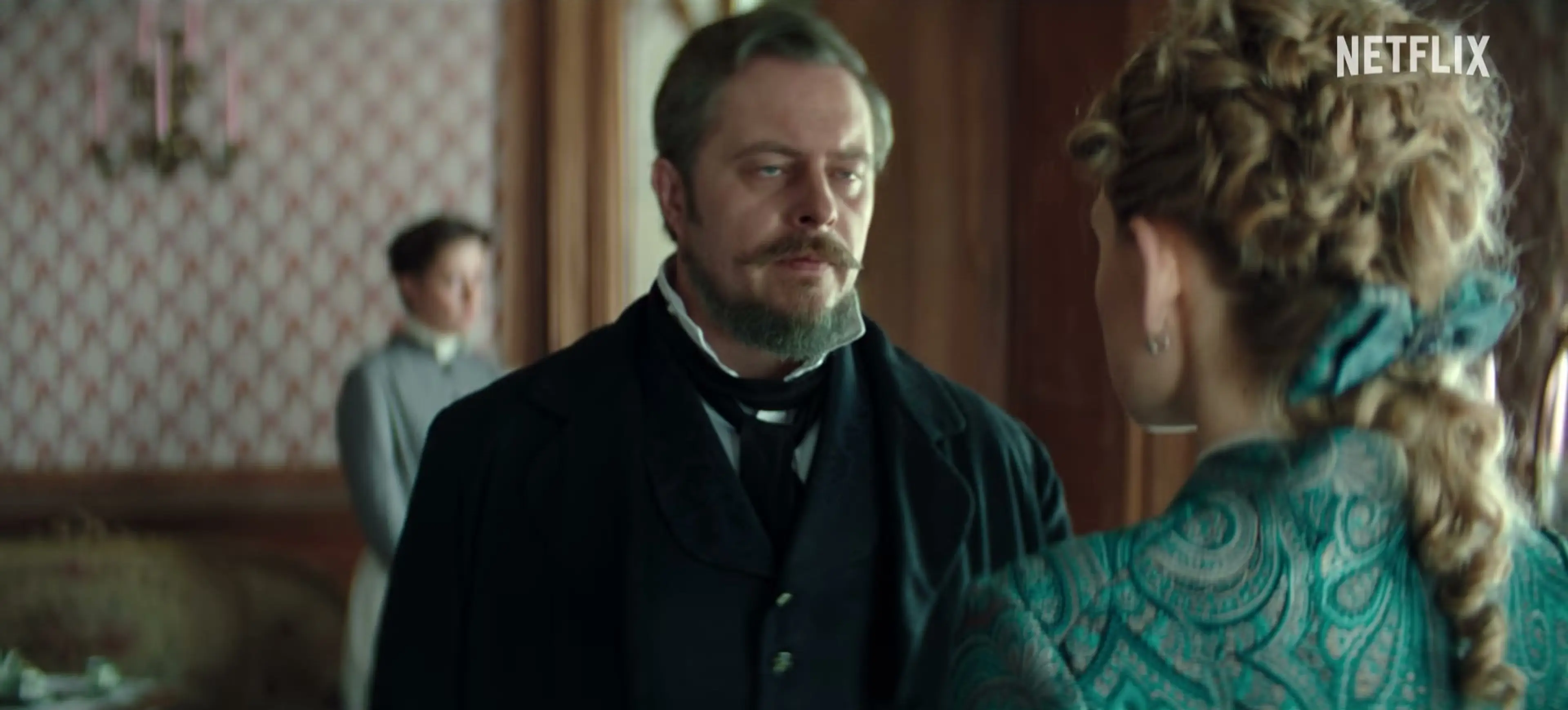Stanisław faces Izabela in a drawing room scene from The Doll.