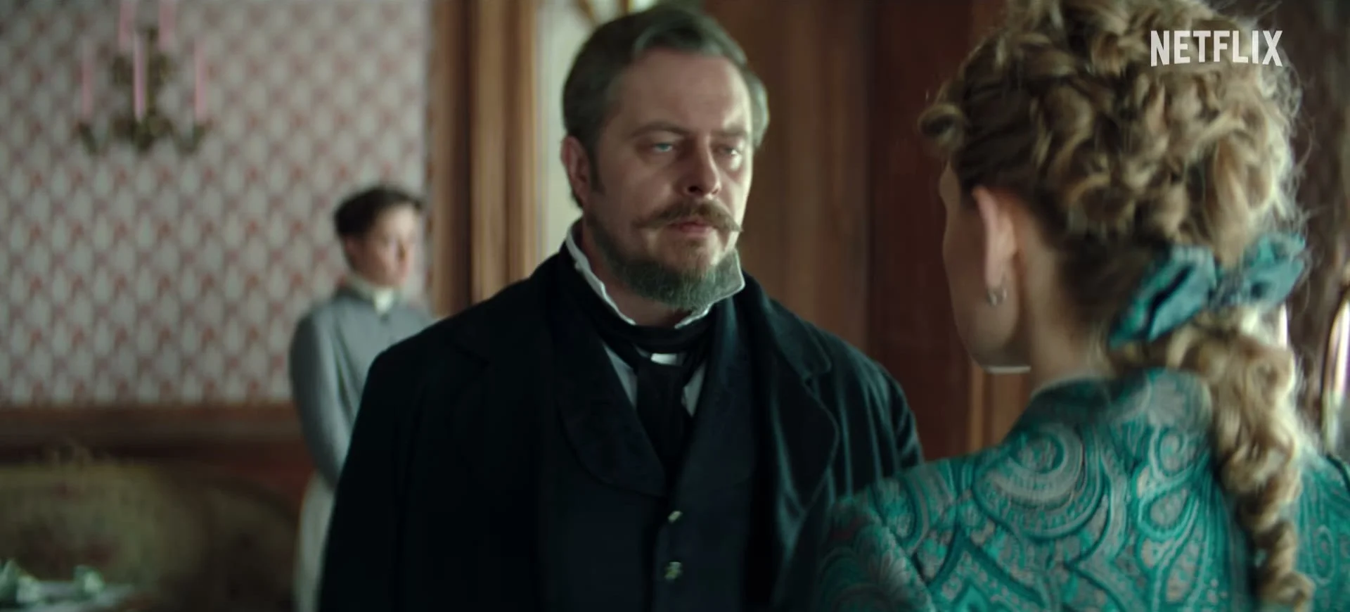 Stanisław faces Izabela in a drawing room scene from The Doll.