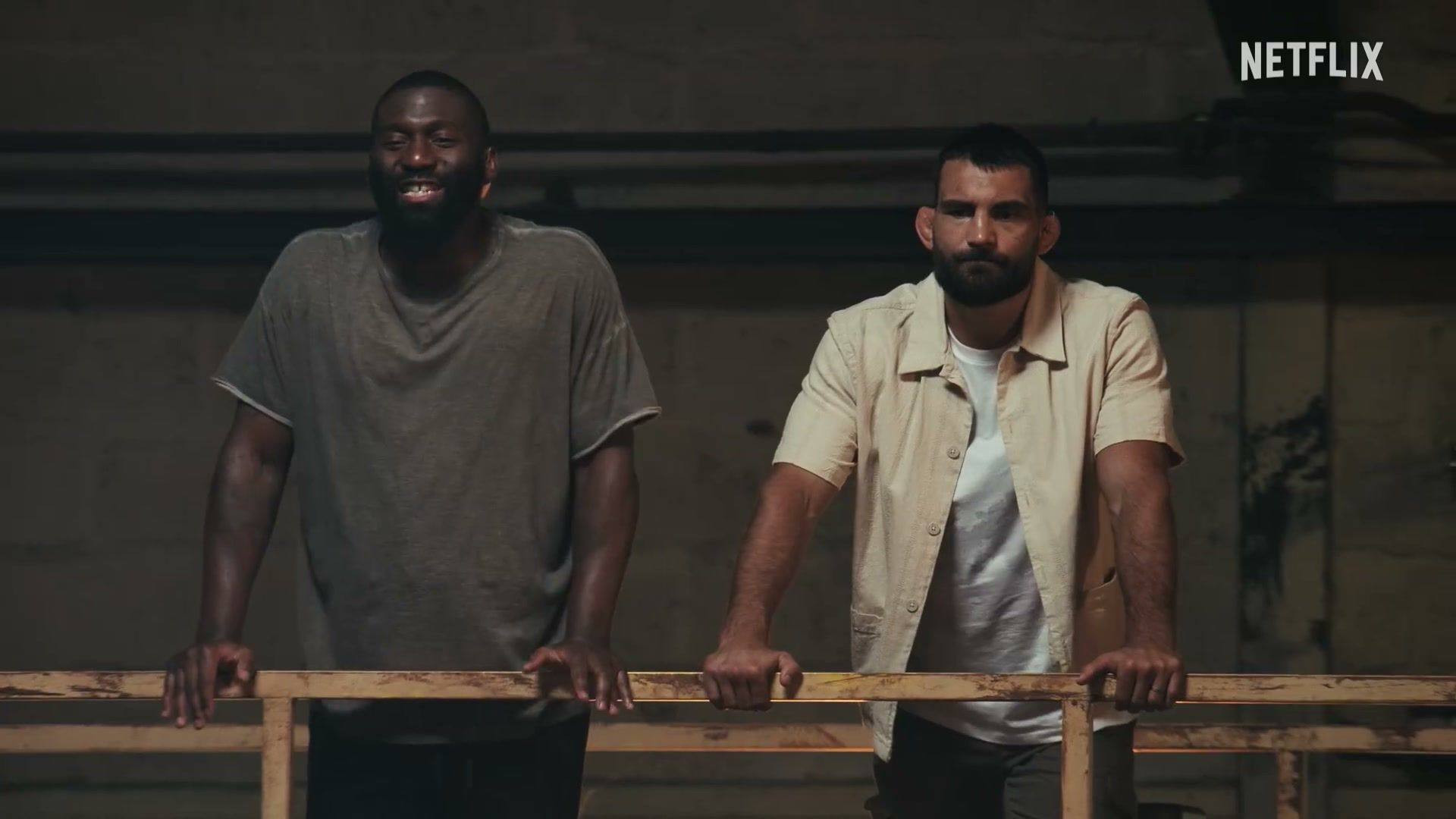 Coaches and contestants gather inside the fight camp in the official L’Arène trailer.