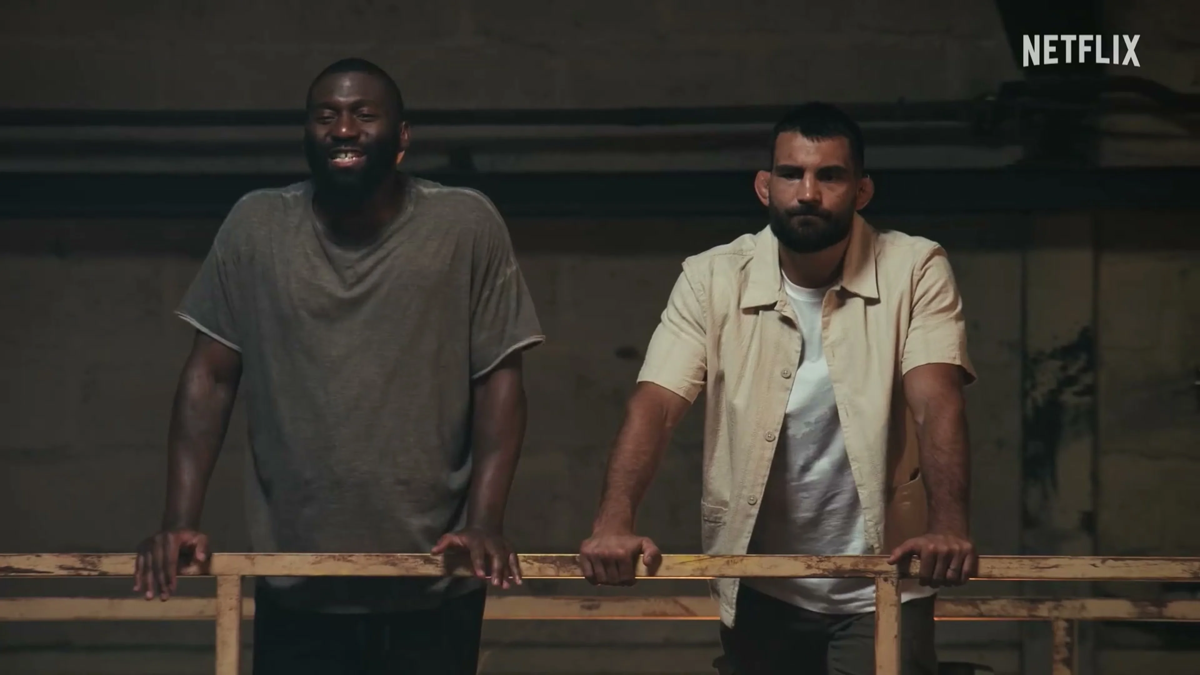 Coaches and contestants gather inside the fight camp in the official L’Arène trailer.
