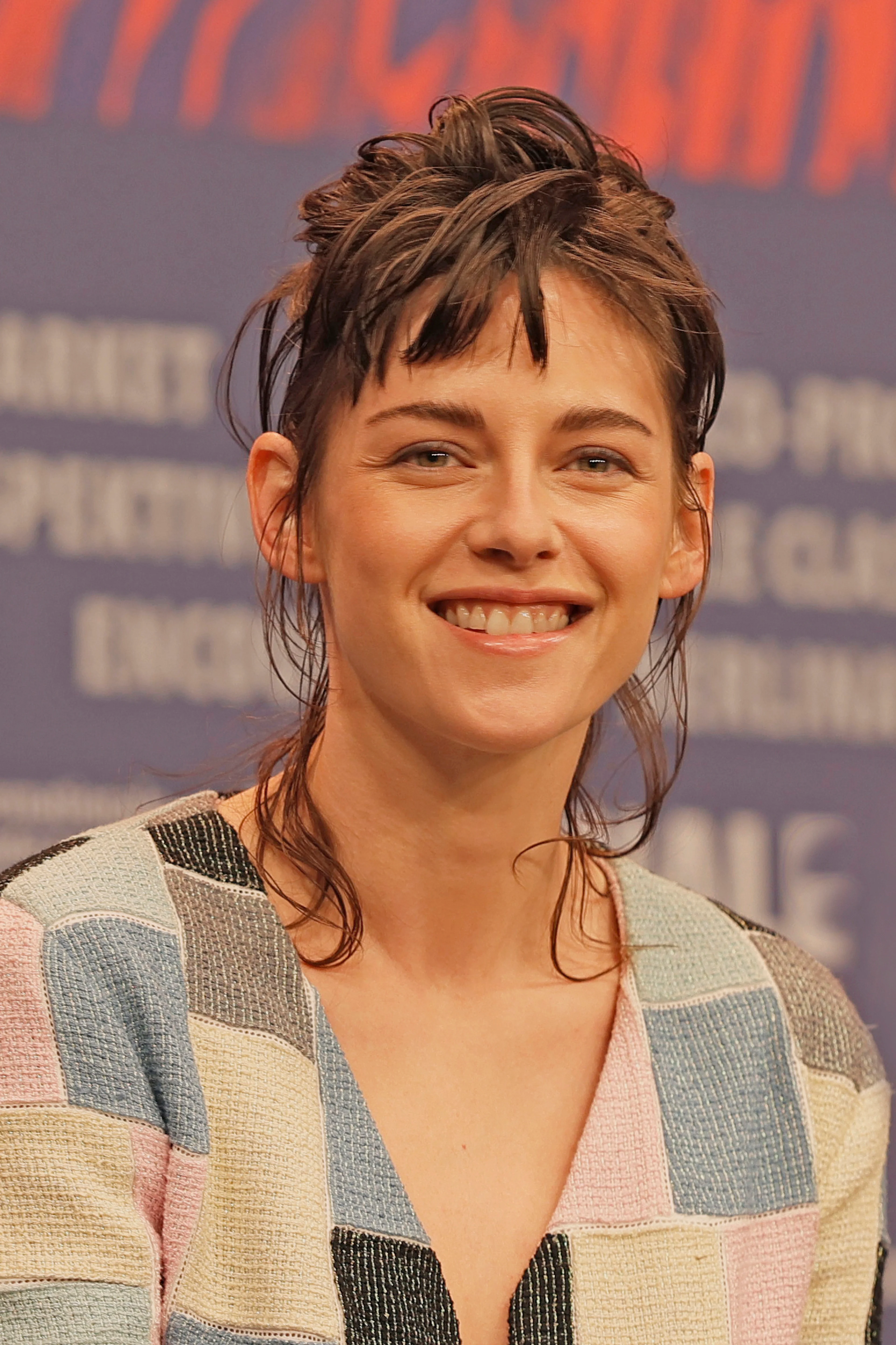 Kristen Stewart smiles at a 2024 Berlin Film Festival event.