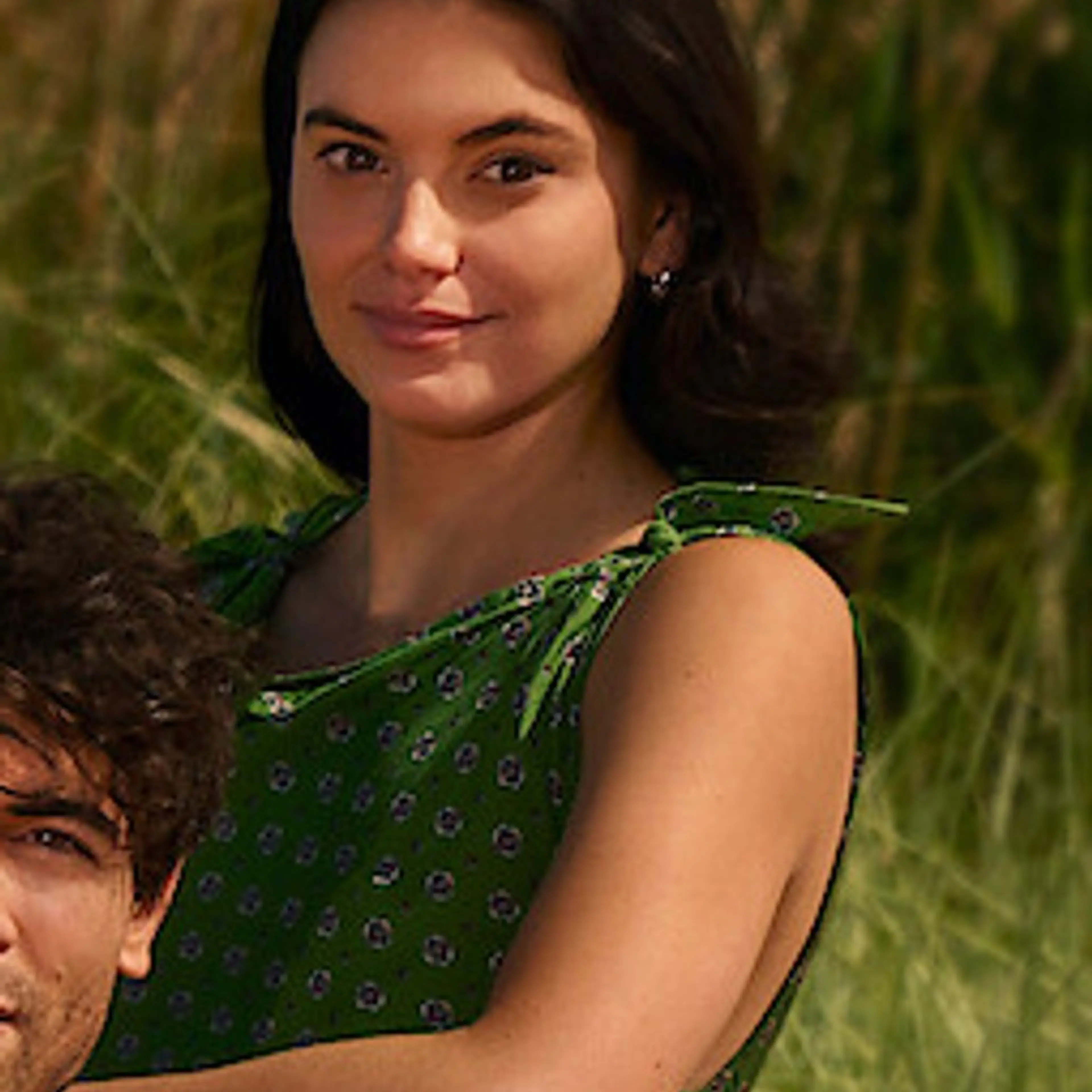 Francesca Reale in a green dress in the official This Summer Will Be Different cast photo.