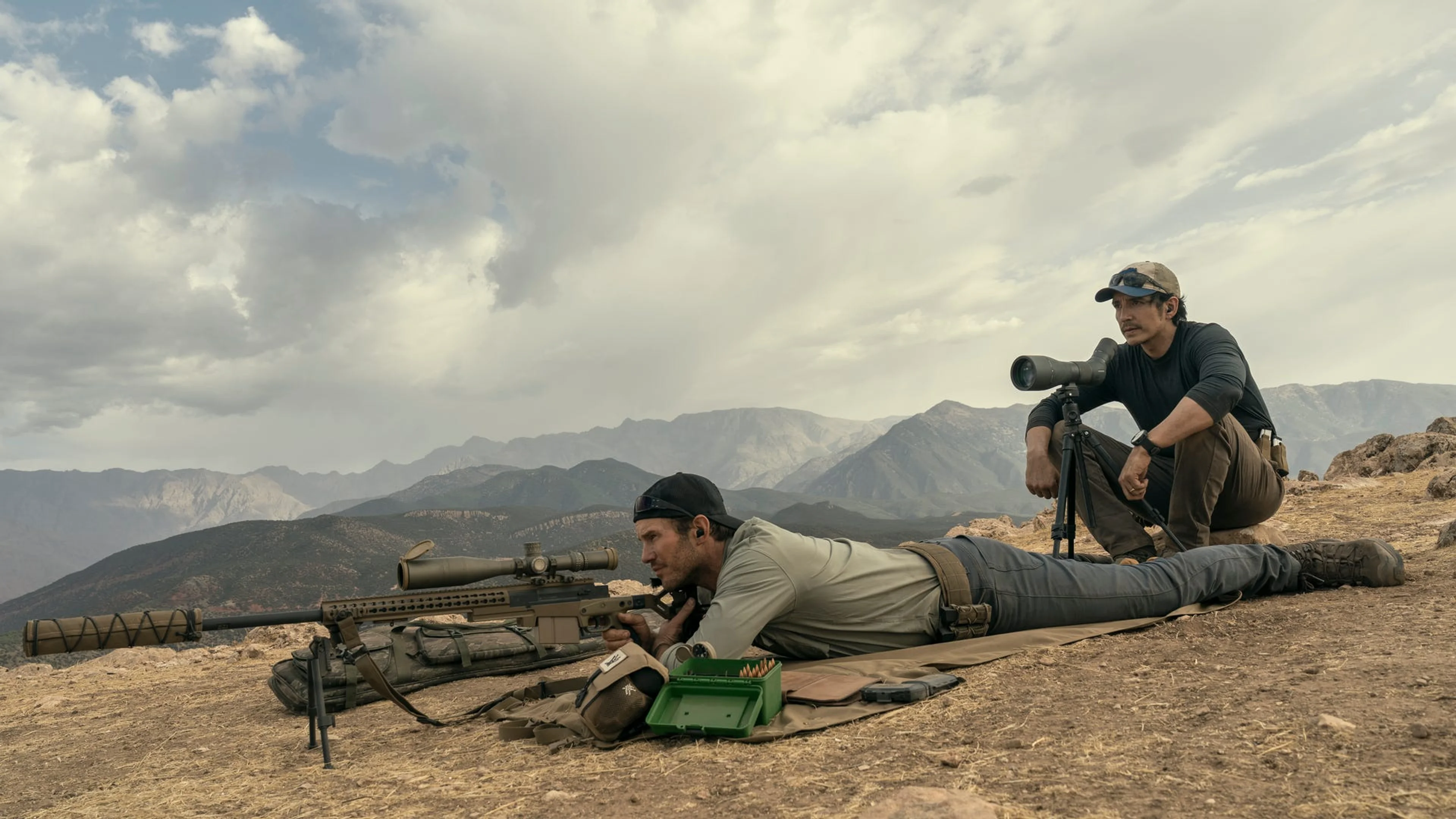 James Reece and Freddy Strain lie beside sniper rifles in The Terminal List Season 2.