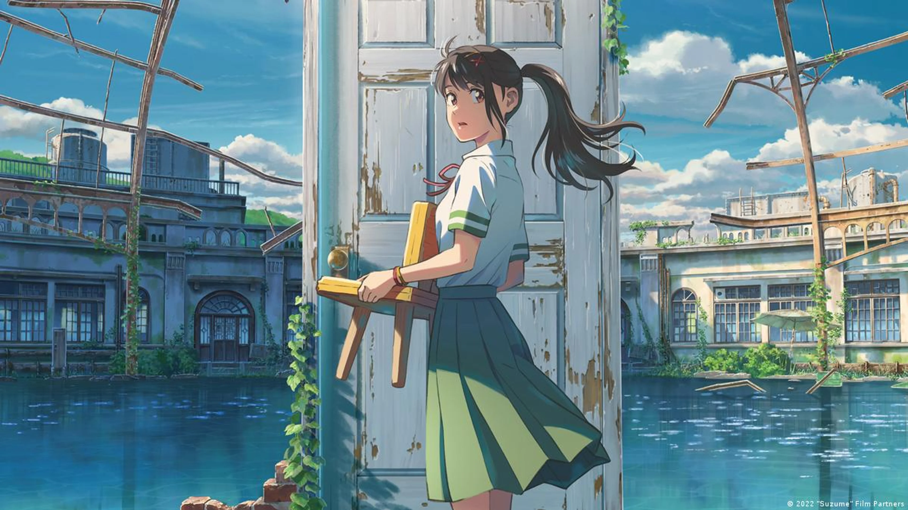 Suzume stands in front of a mysterious door in an abandoned flooded building.