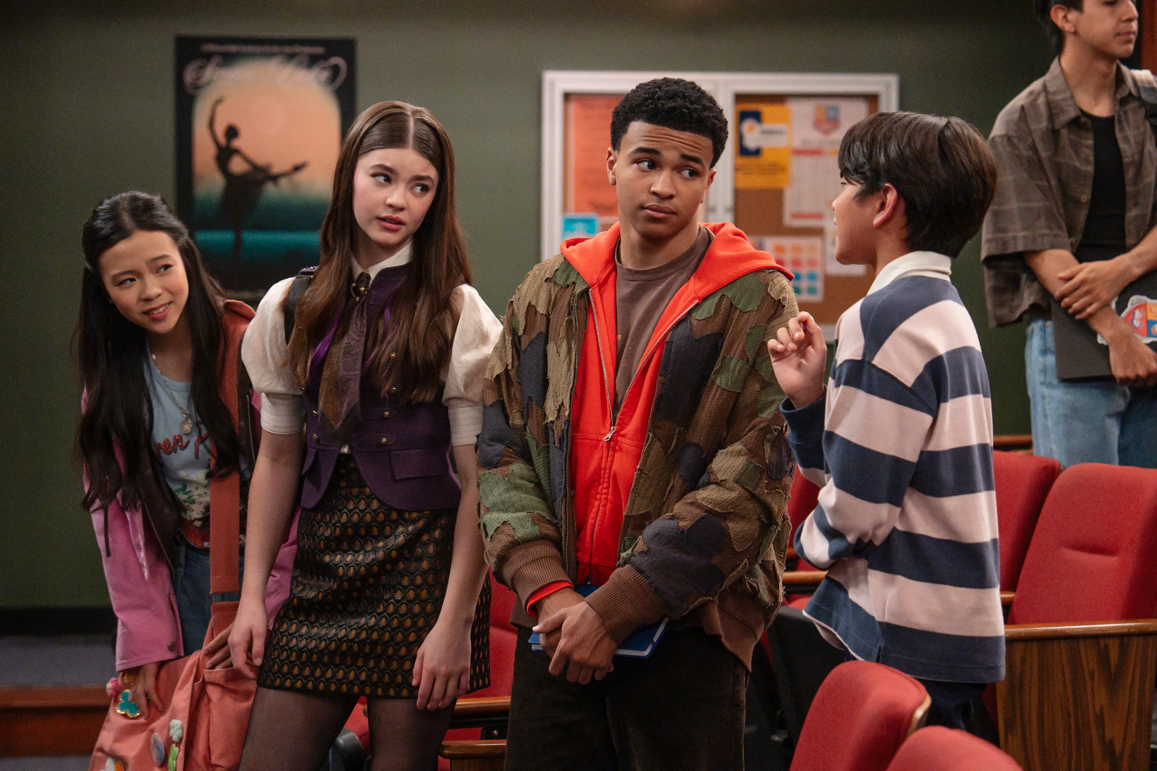 Jiwon Lee, Kenzi Richardson, Shaun Dixon, Milo Maharlika, and other students gather at Wilson Hall in Vampirina Season 2.