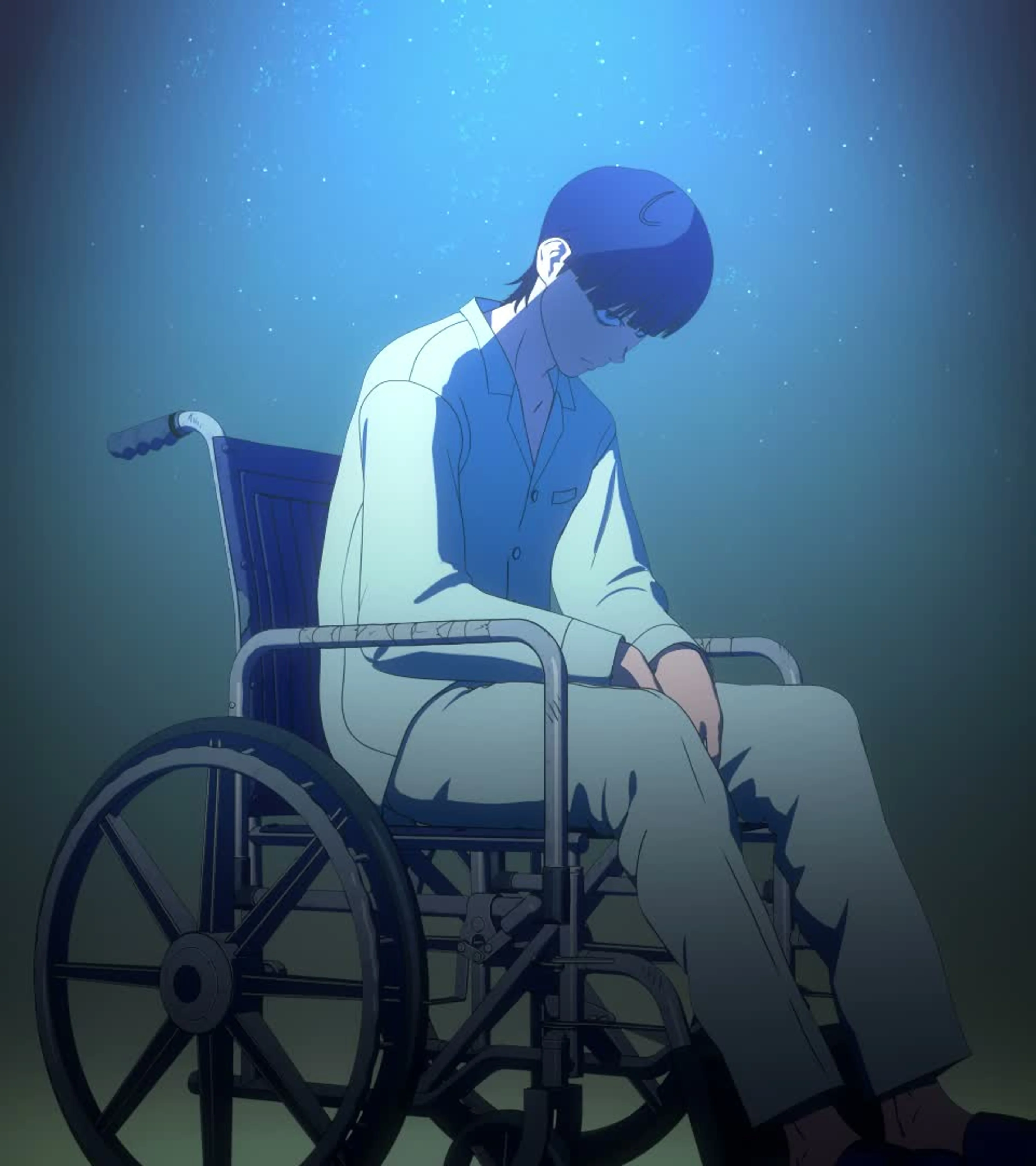Nagi Taira sits under a blue spotlight in his wheelchair in the Tank Chair anime.
