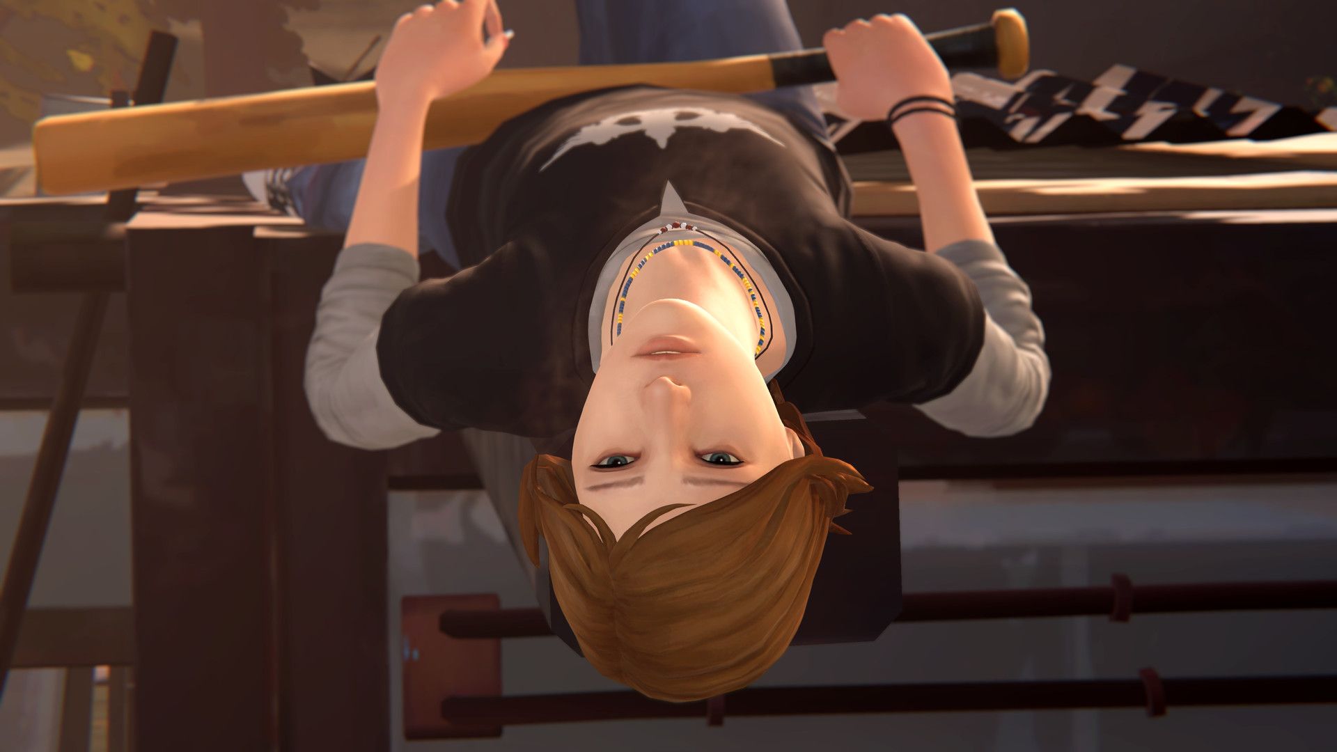 Chloe Price hangs upside down in a scene from Before the Storm.