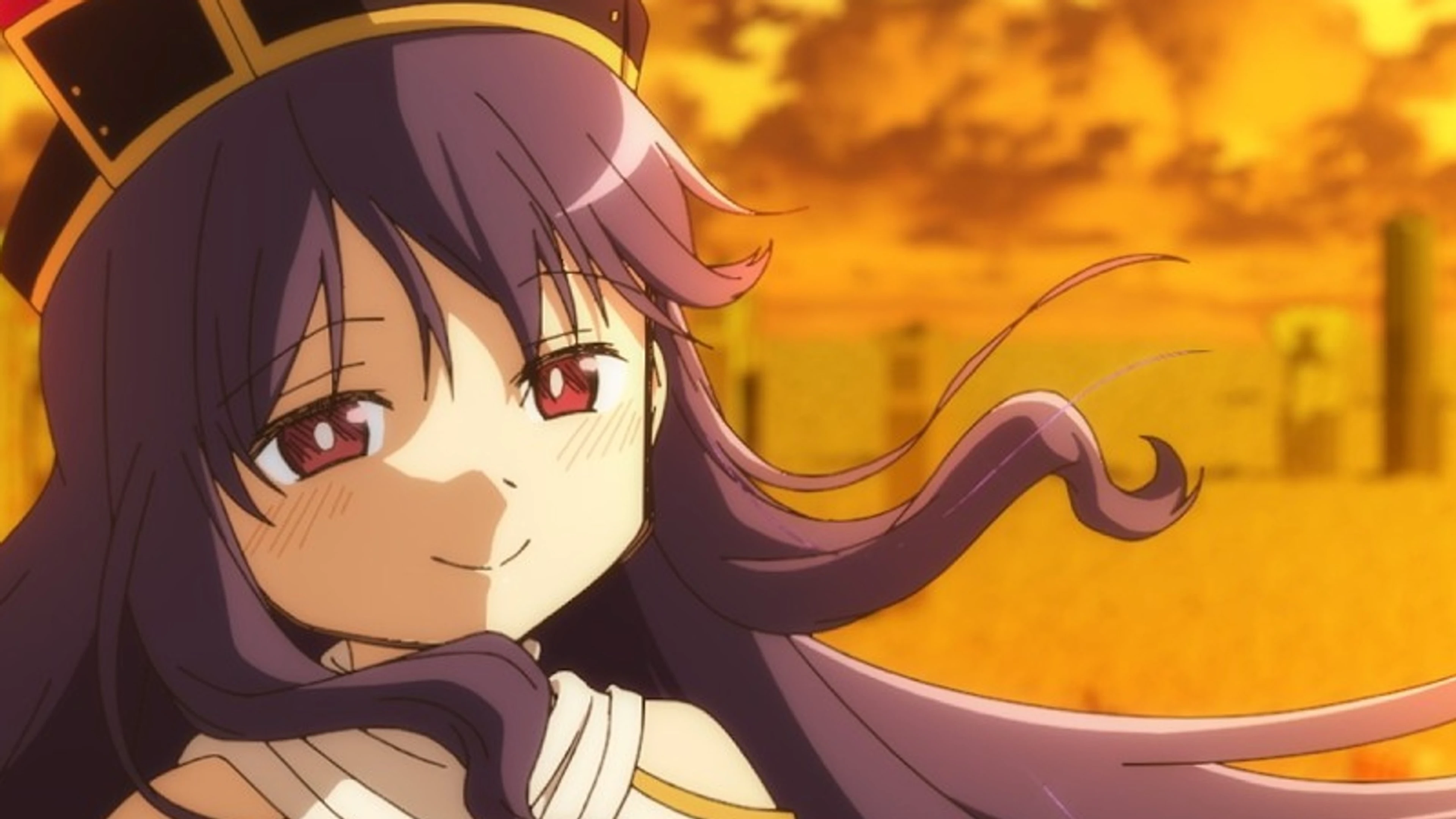 The new Madoka Magica character WAS looks toward the camera against an orange sky.