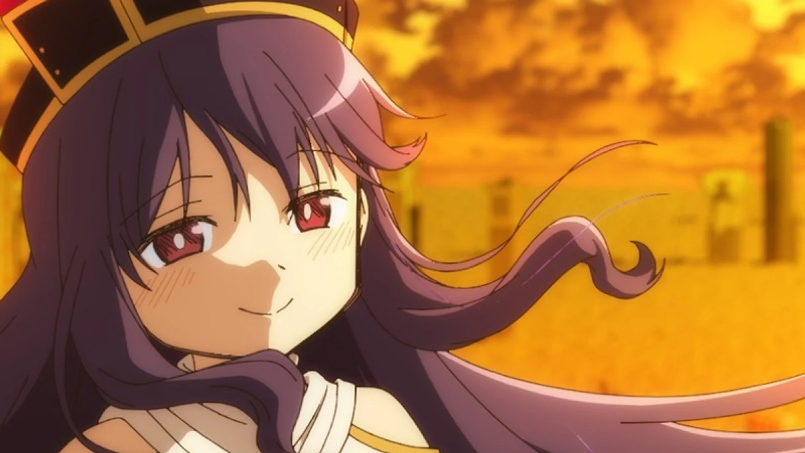 The new Madoka Magica character WAS looks toward the camera against an orange sky.
