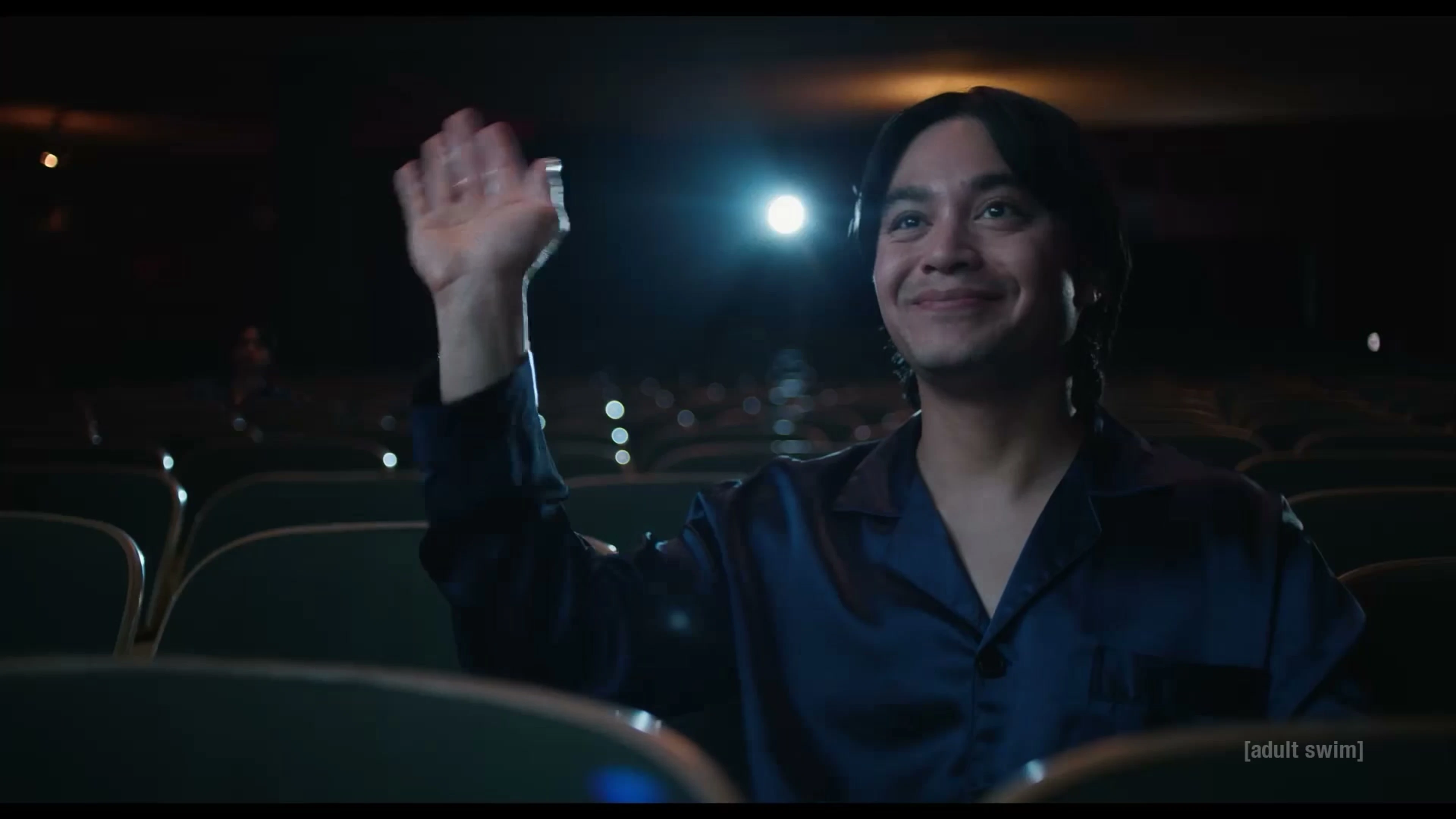 Jordan Mendoza waves from a cinema seat in The Terrors of Jordan Mendoza.