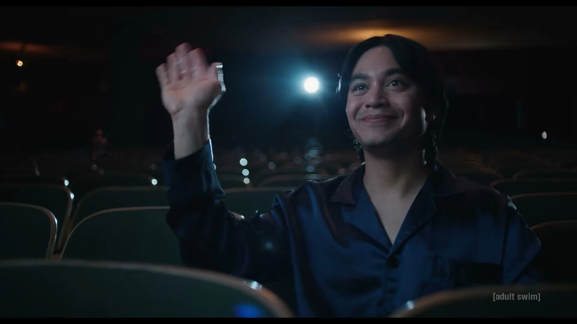 Jordan Mendoza waves from a cinema seat in The Terrors of Jordan Mendoza.