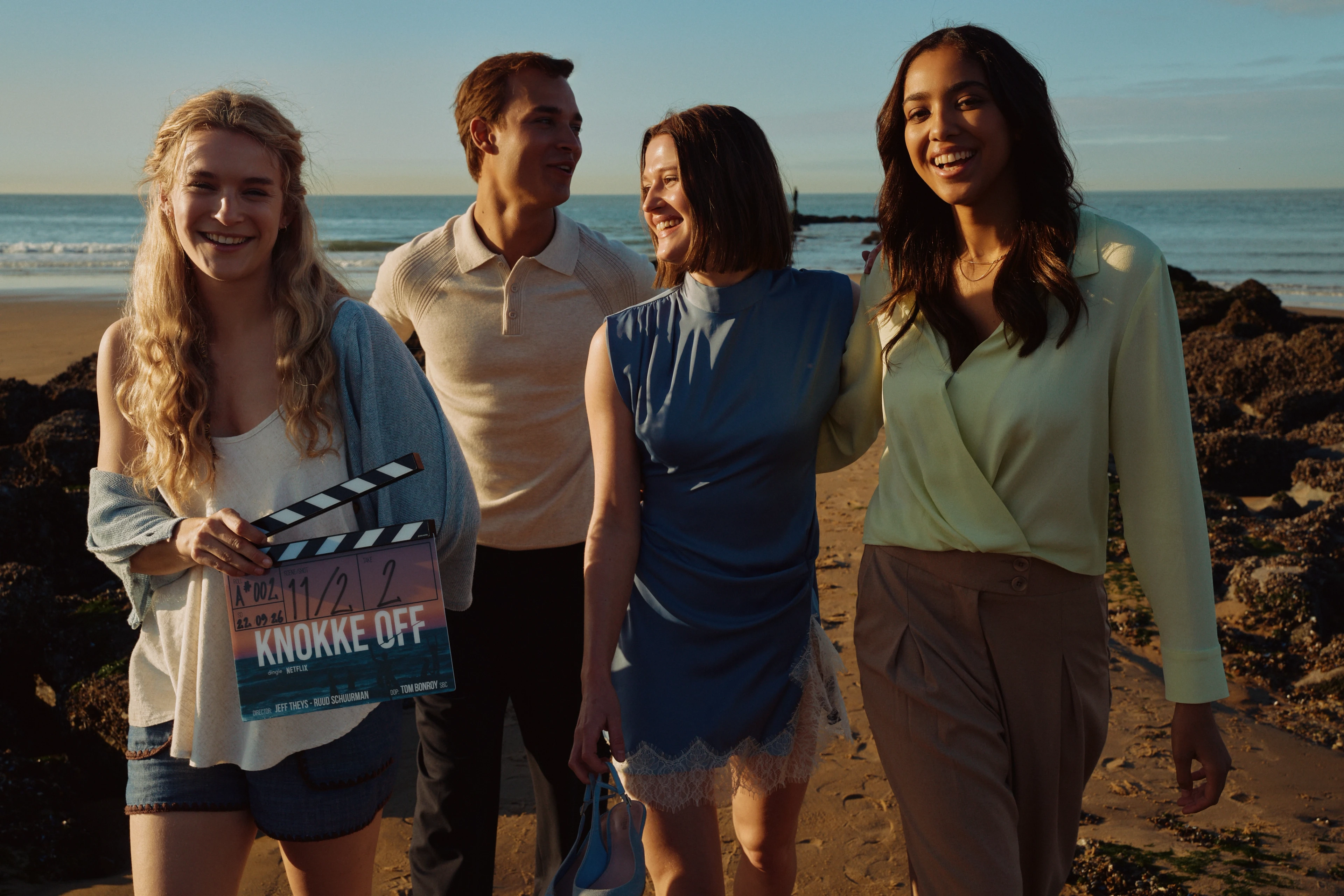 Four High Tides cast members pose on a beach at the start of filming for the movie.