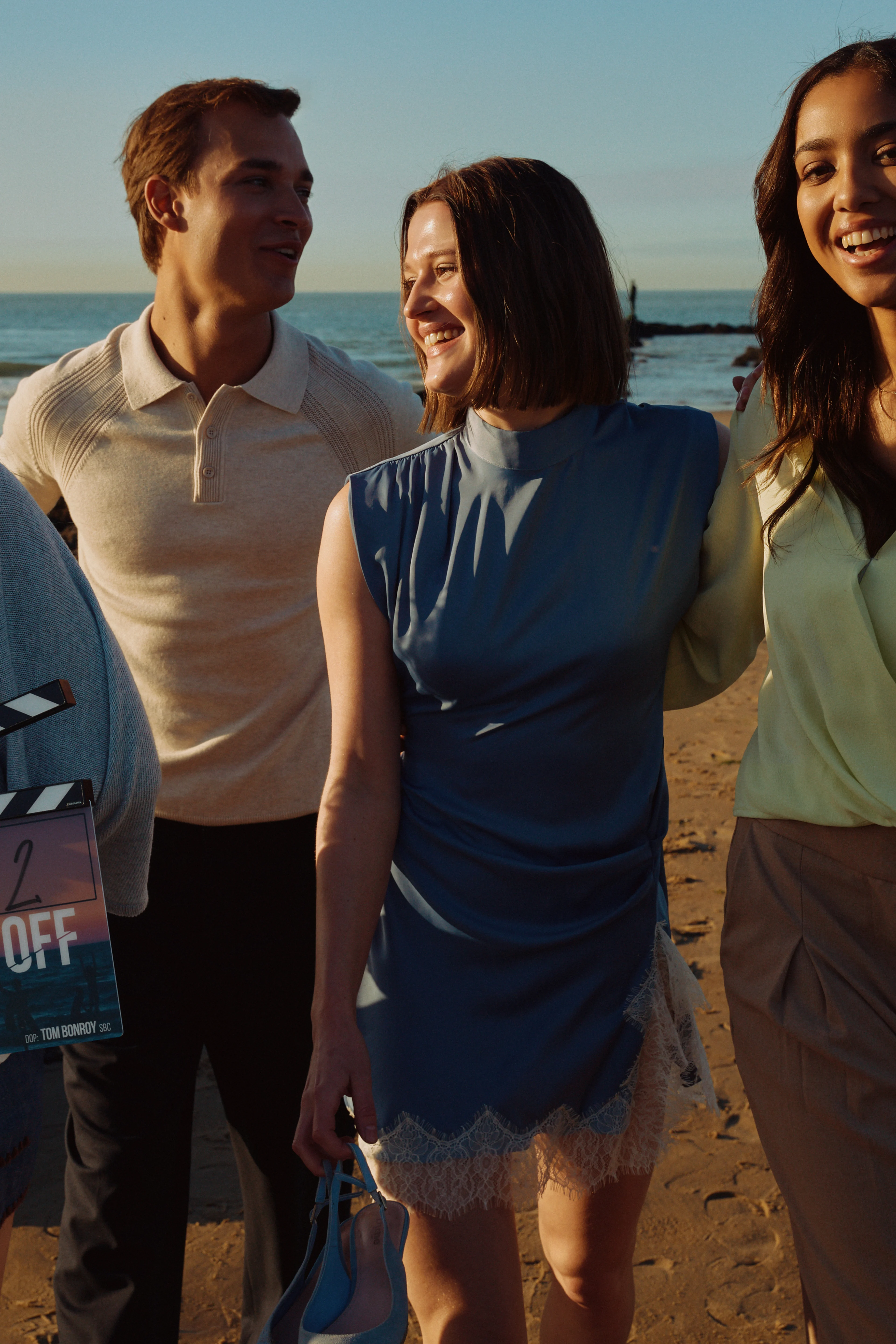 Four High Tides cast members pose on a beach at the start of filming for the movie.