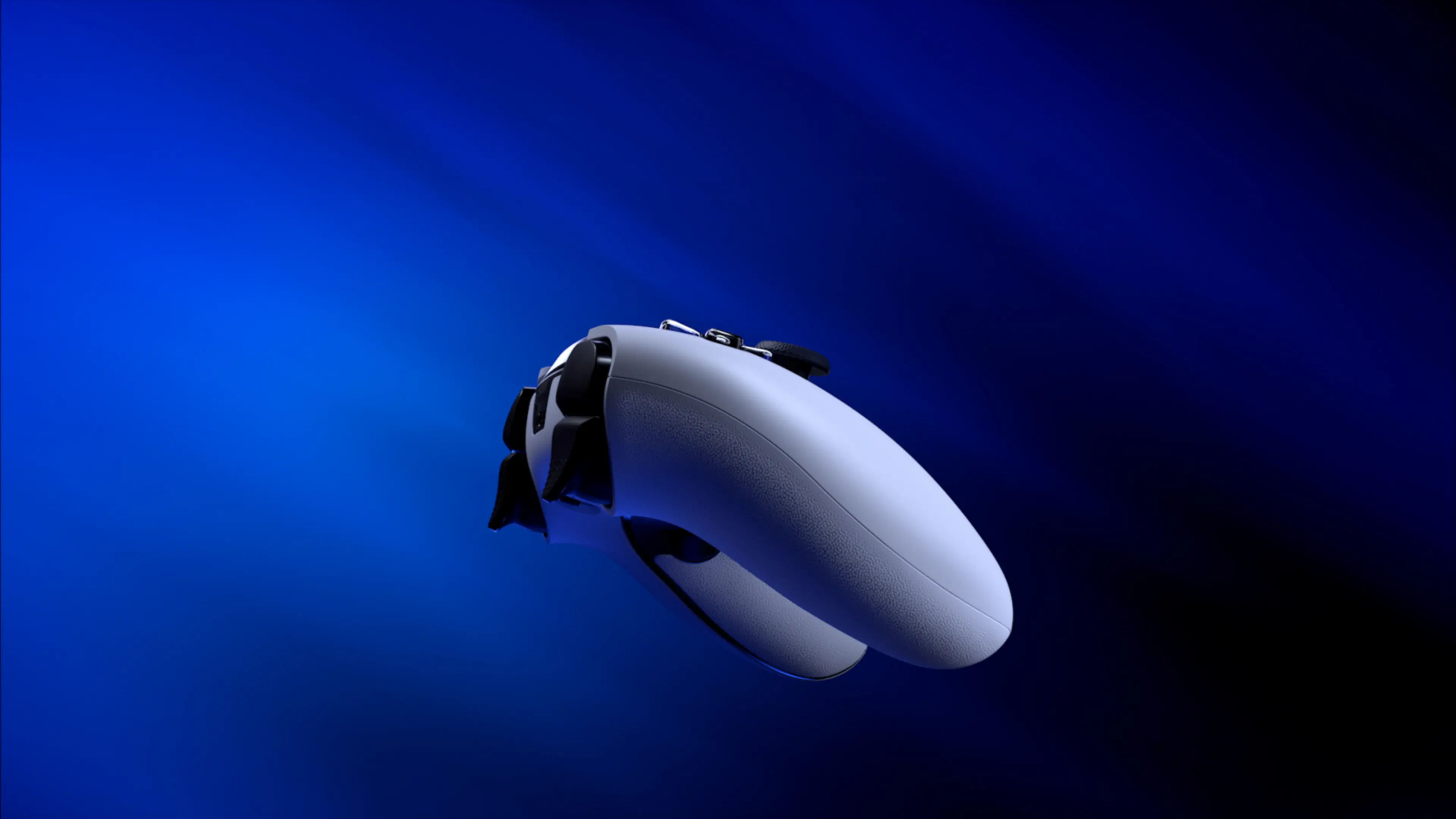 Side view of the DualSense Edge against a blue background