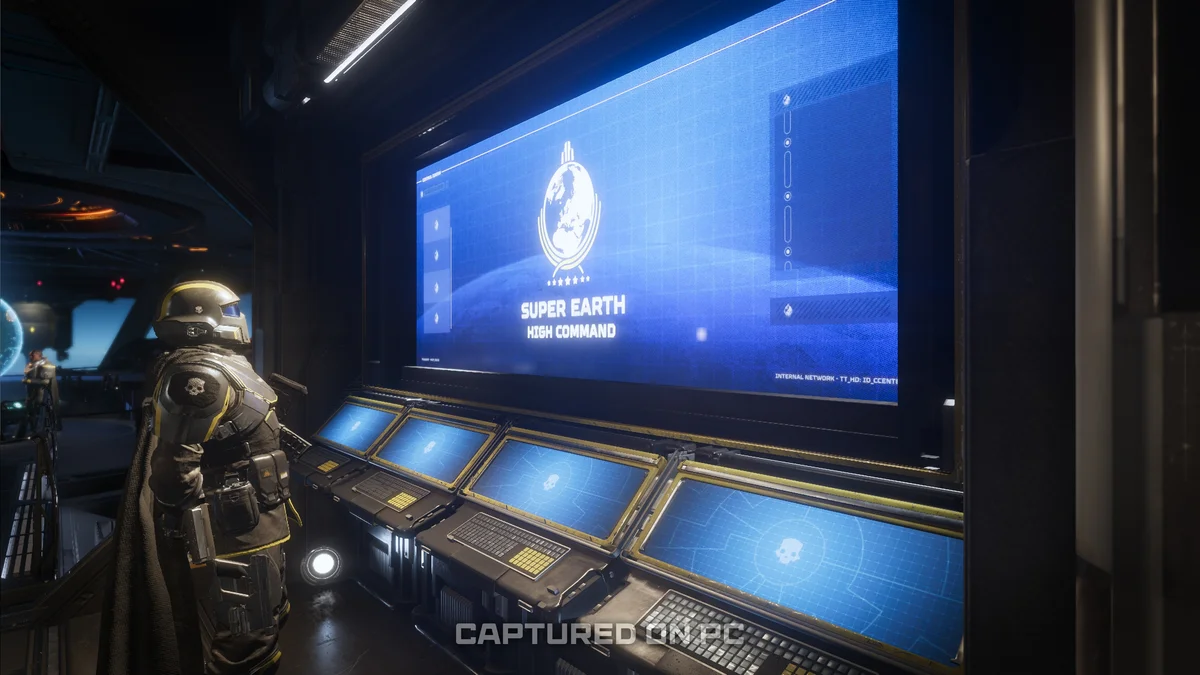 A Helldiver stands at the Galactic War Campaigns Control Center aboard a Super Destroyer.