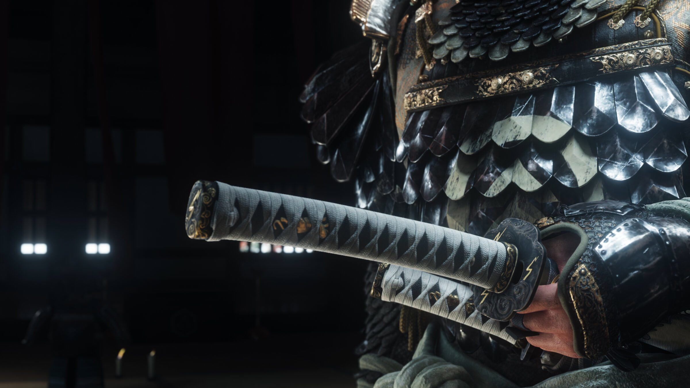Jin Sakai grips his katana in Ghost of Yōtei Most Wanted.
