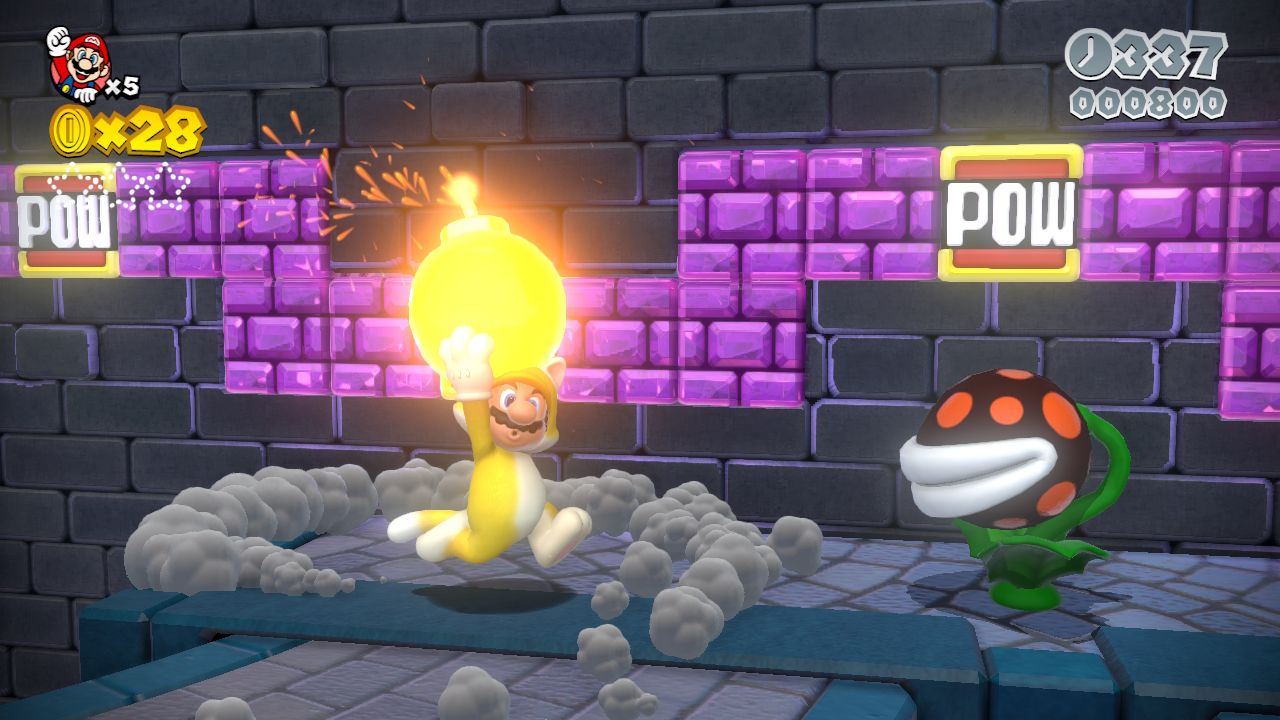Cat Mario runs near two purple POW blocks and a Piranha Plant.