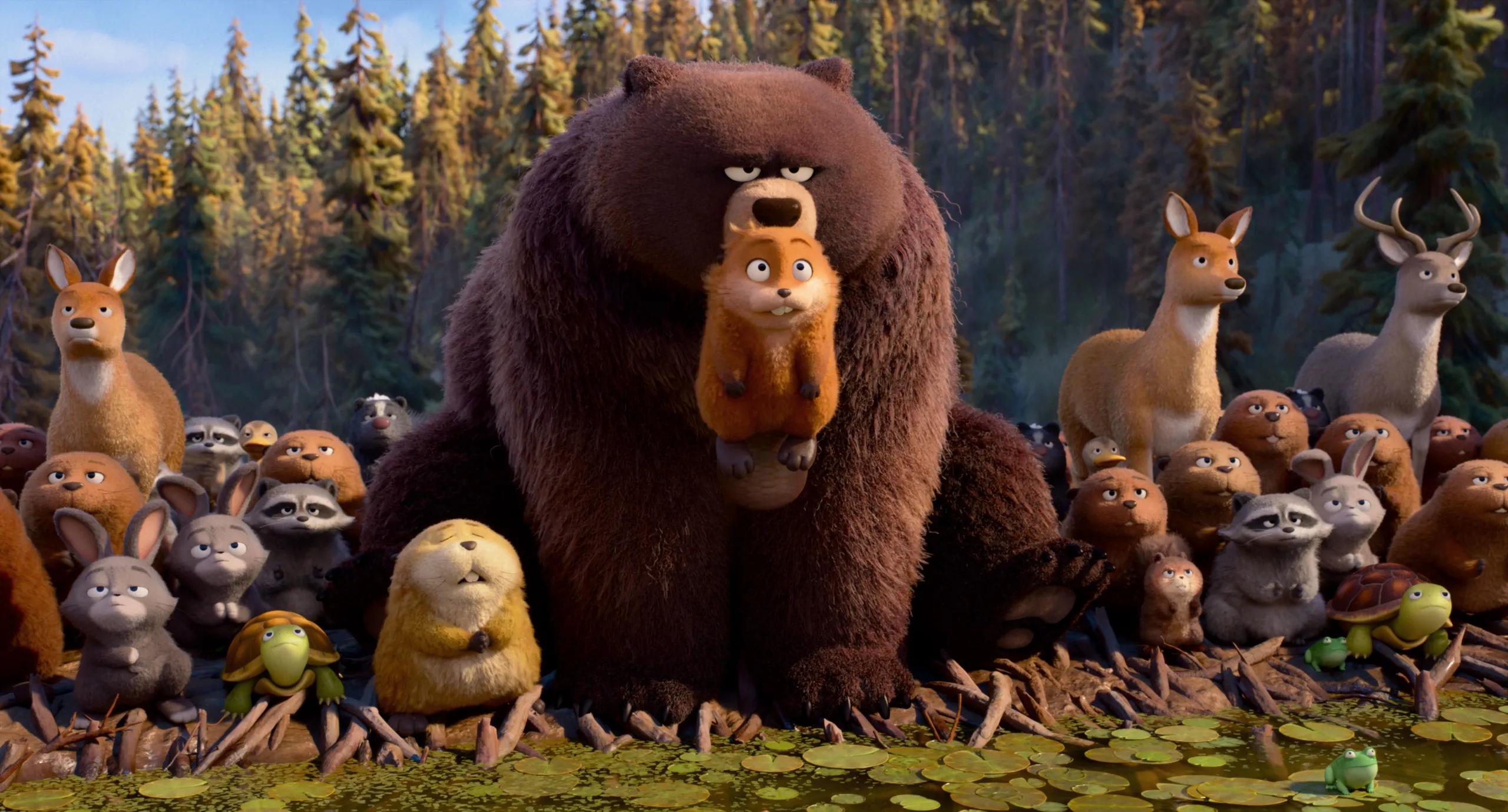 Ellen Bear holds Mabel the robotic beaver in her mouth while woodland animals gather nearby.