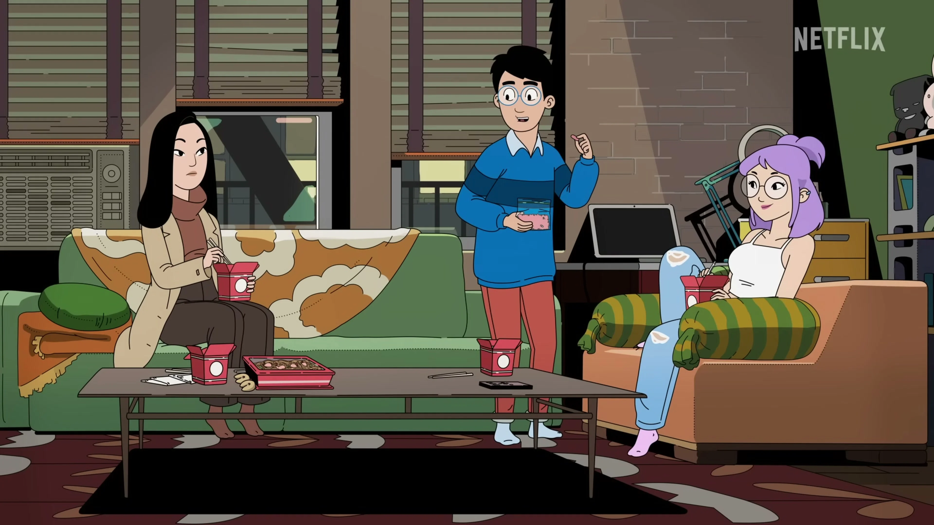 Andrew, Eunice, and Ruthie eat takeout together in their apartment in DANG!.