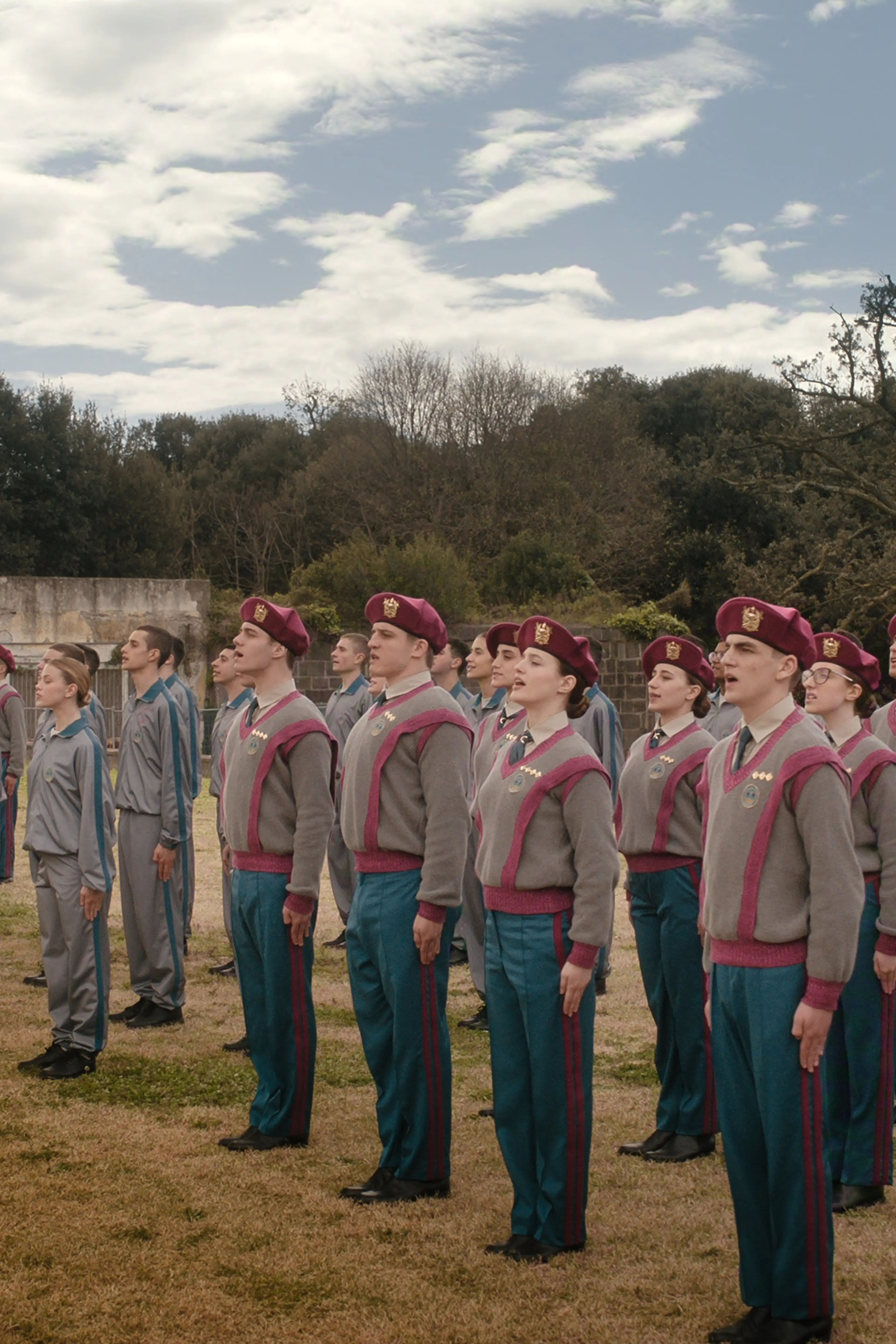 Students stand in formation during a ceremony at Minerva Academy.