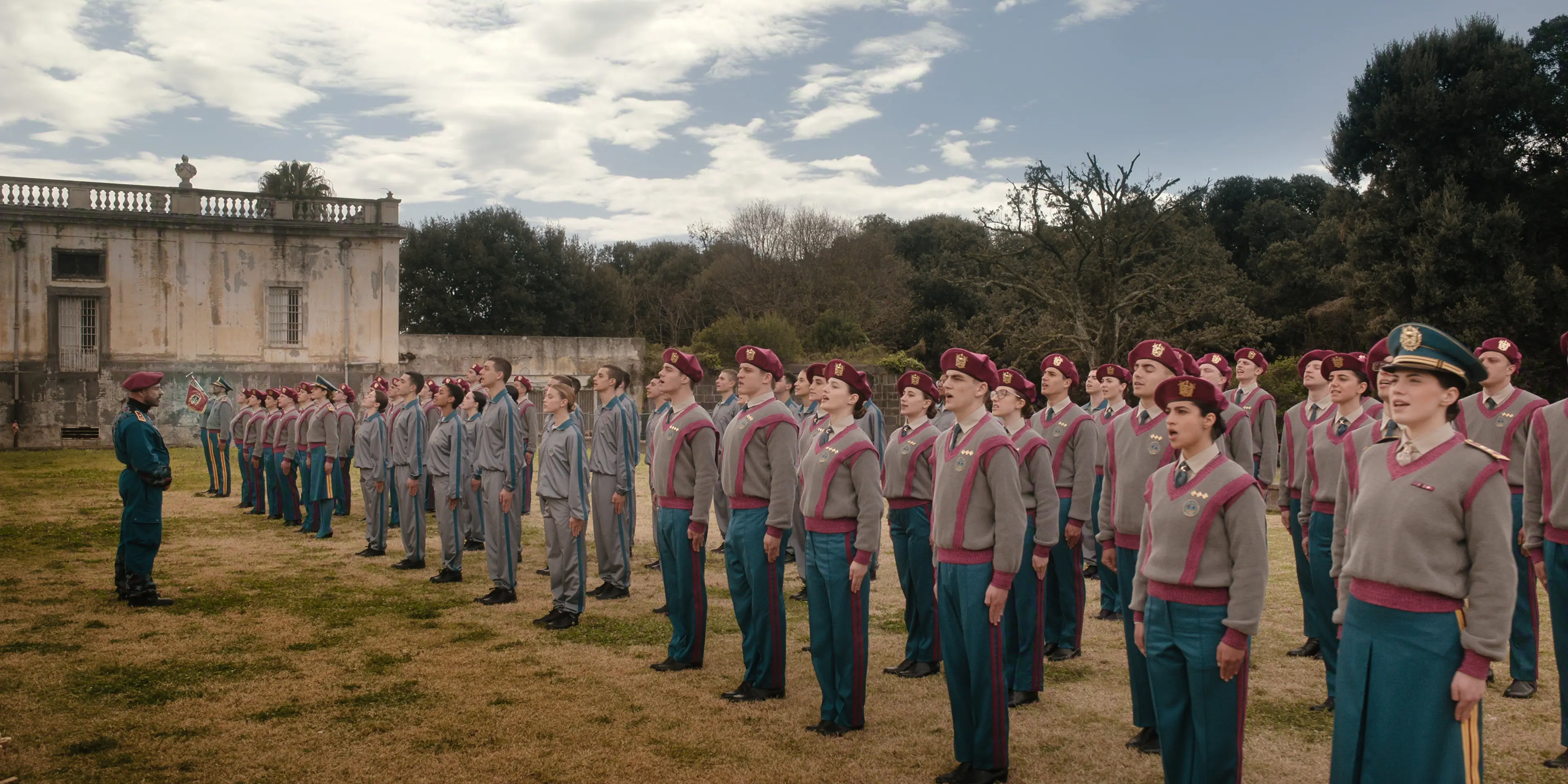 Students stand in formation during a ceremony at Minerva Academy.