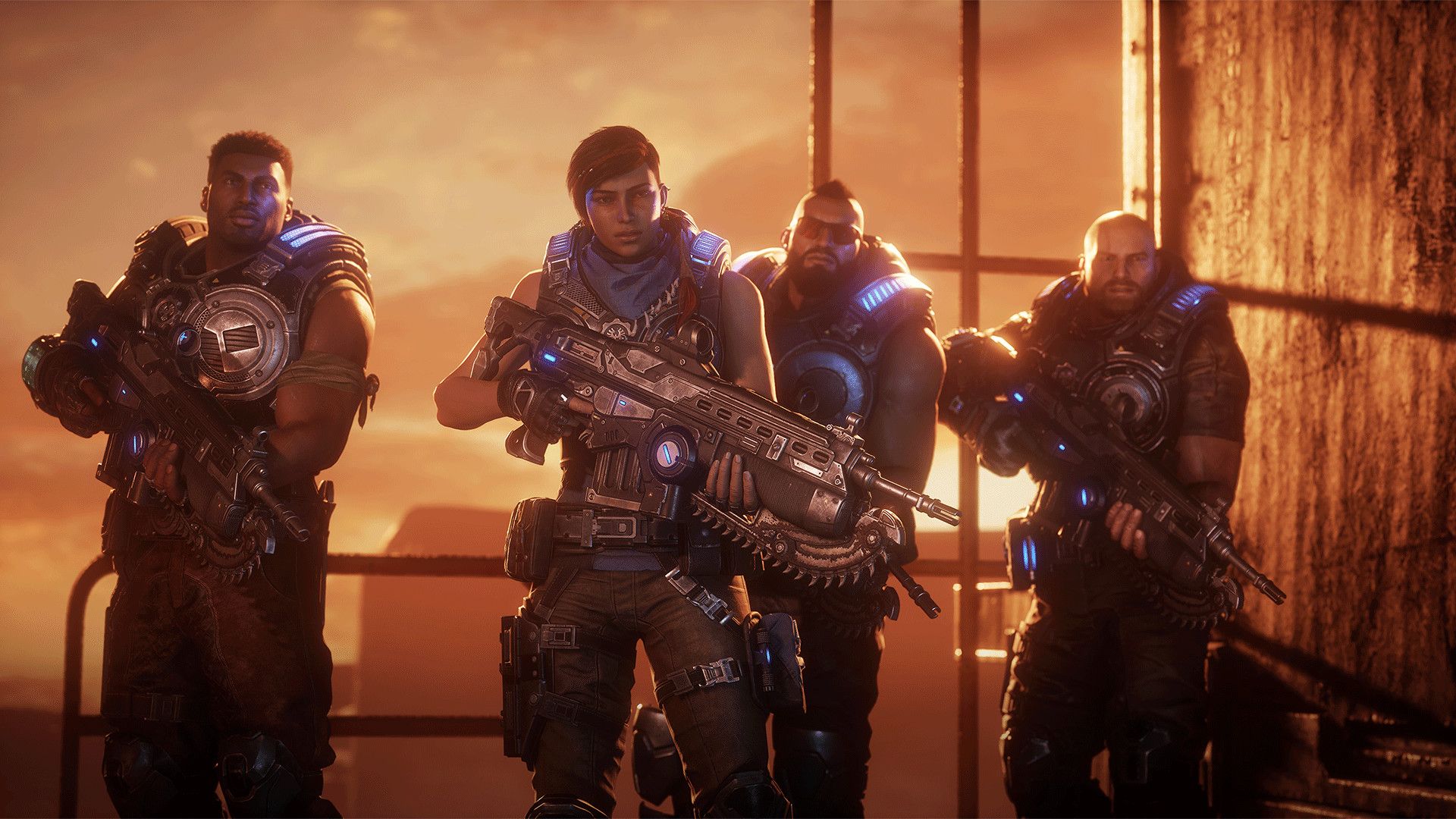 Four Gears 5 squad members stand together with weapons against a warm orange sky.