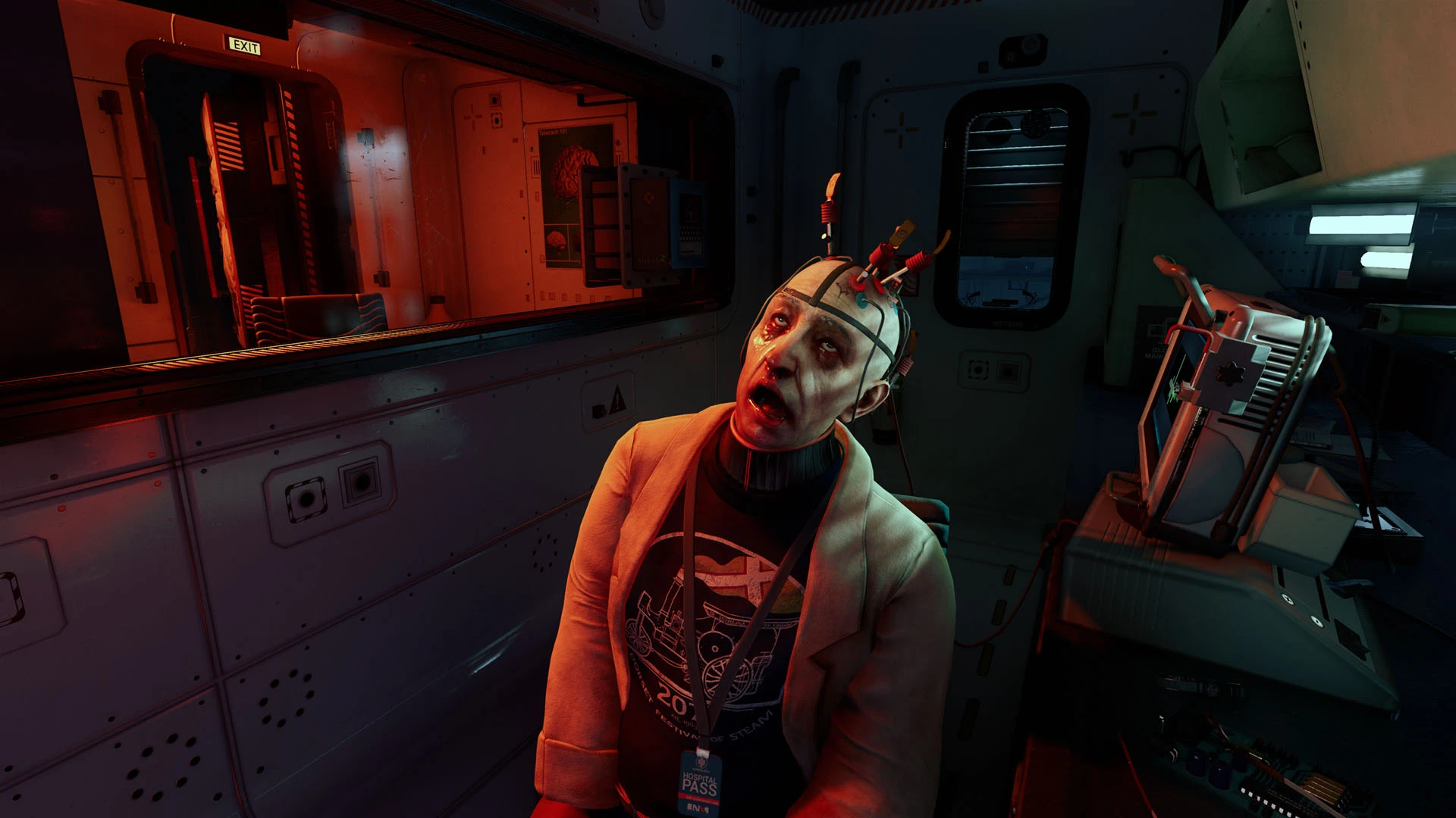 Crombie sits beneath probes and cables beside the Rat Server in ONTOS.