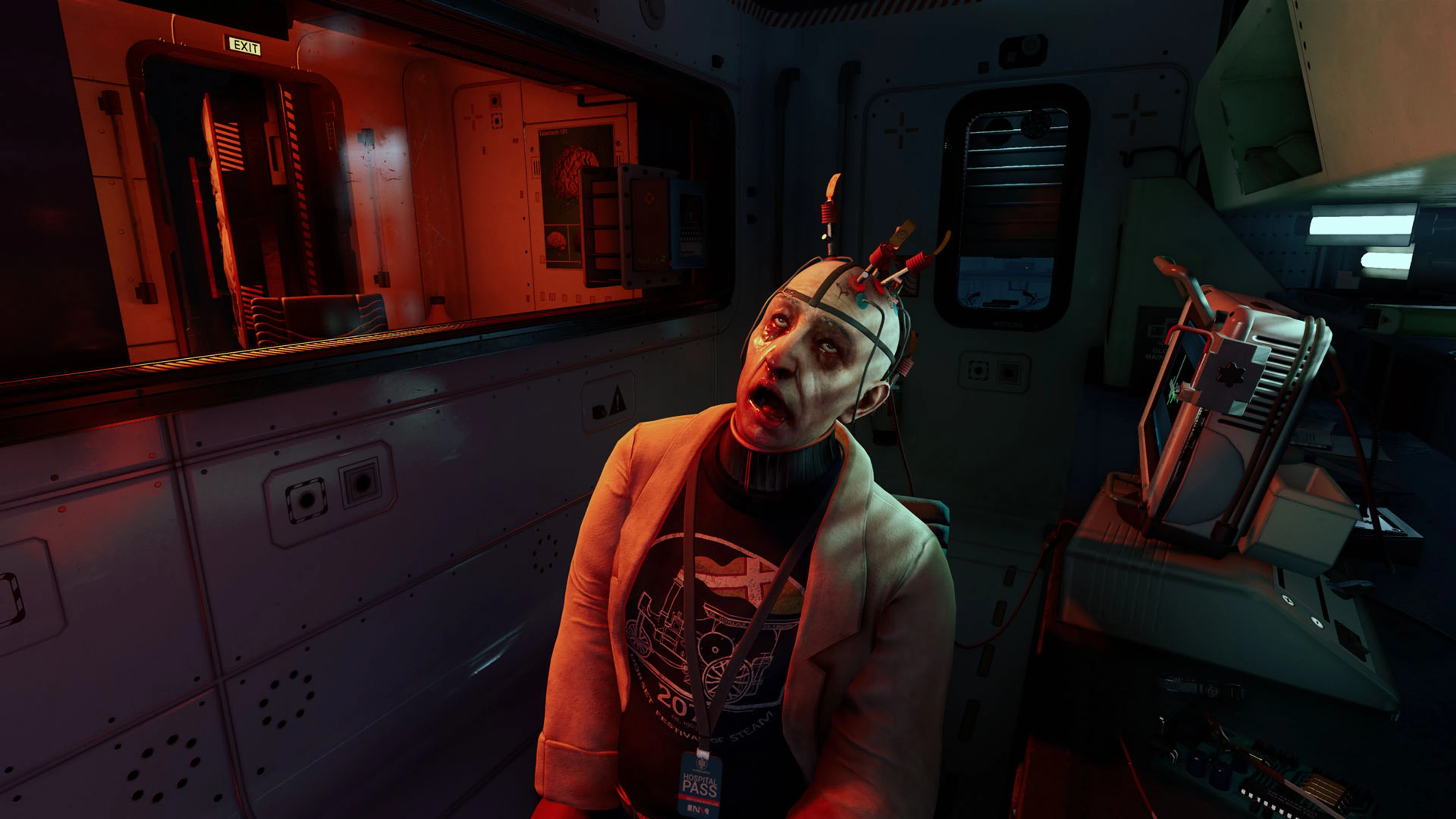 Crombie sits beneath probes and cables beside the Rat Server in ONTOS.