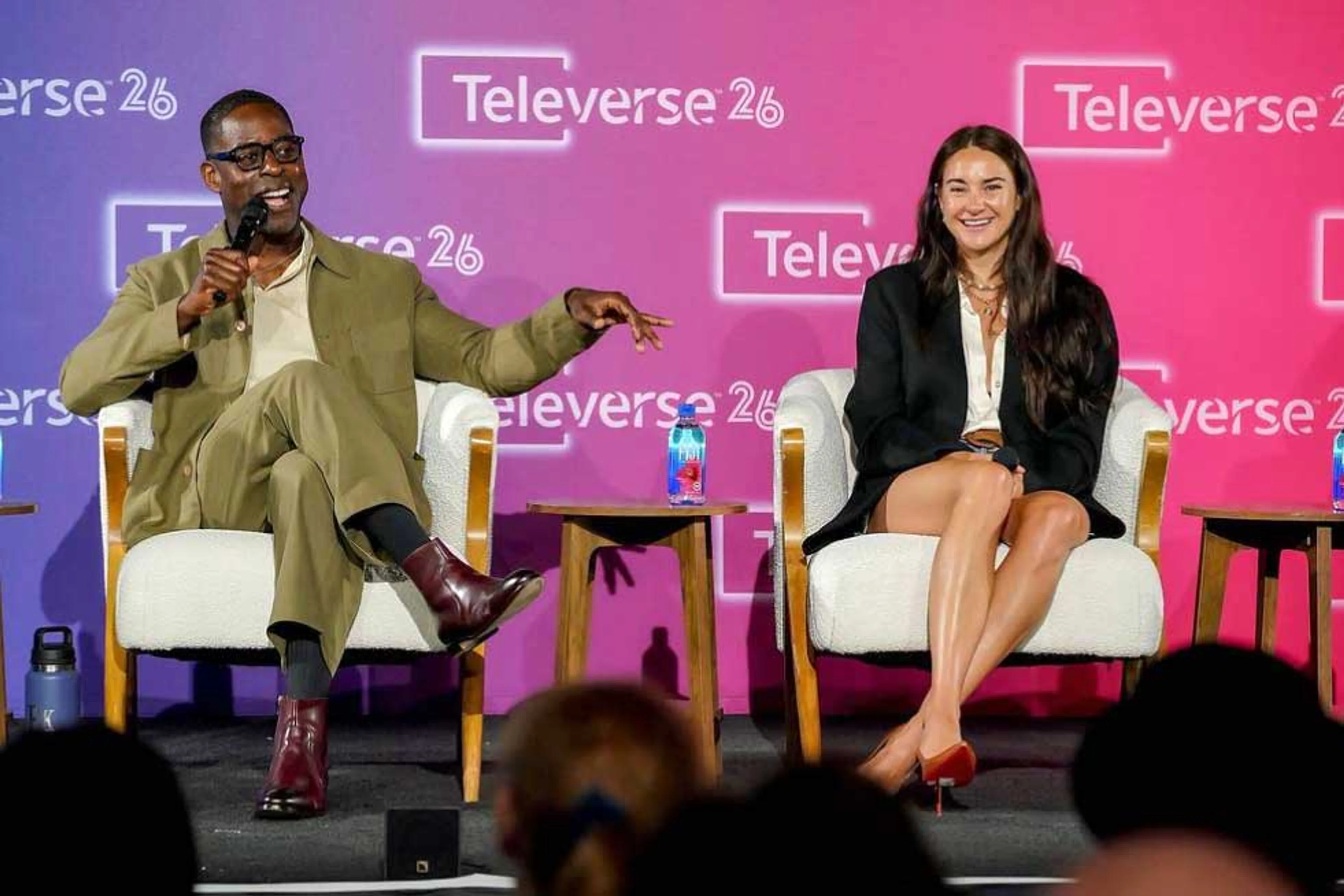 Sterling K. Brown and Shailene Woodley sit onstage during a Paradise panel at Televerse 26.