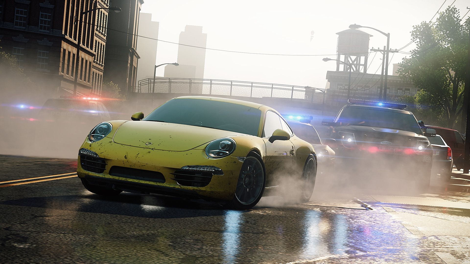 Yellow Porsche drives through a city road with police vehicles following in Most Wanted.
