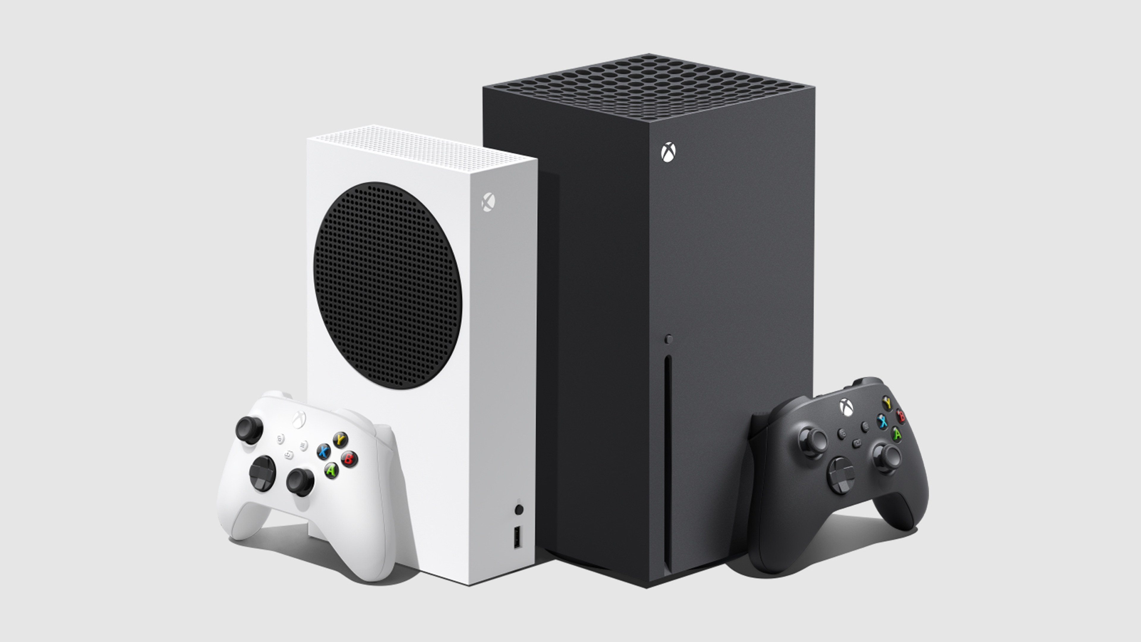 Xbox Series S and Xbox Series X consoles stand beside their controllers.