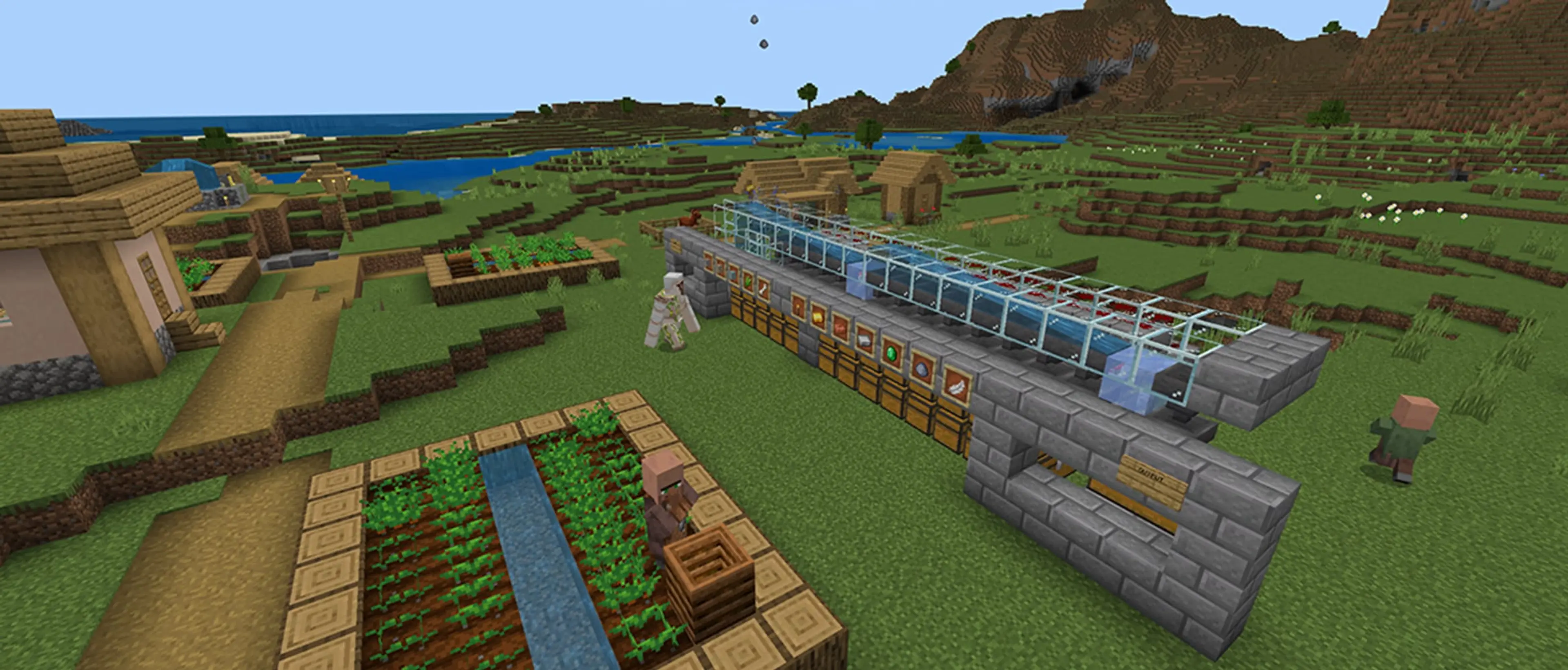 A large working redstone sorting system built beside a Minecraft village.