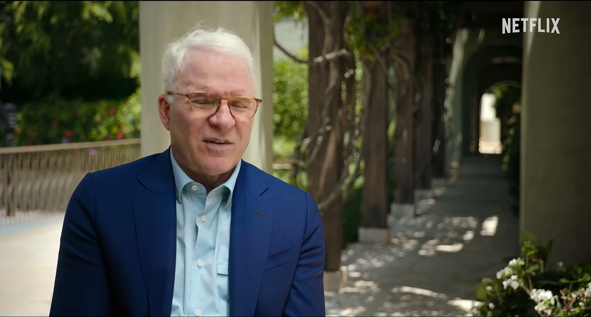 Steve Martin speaks outdoors in the Netflix documentary