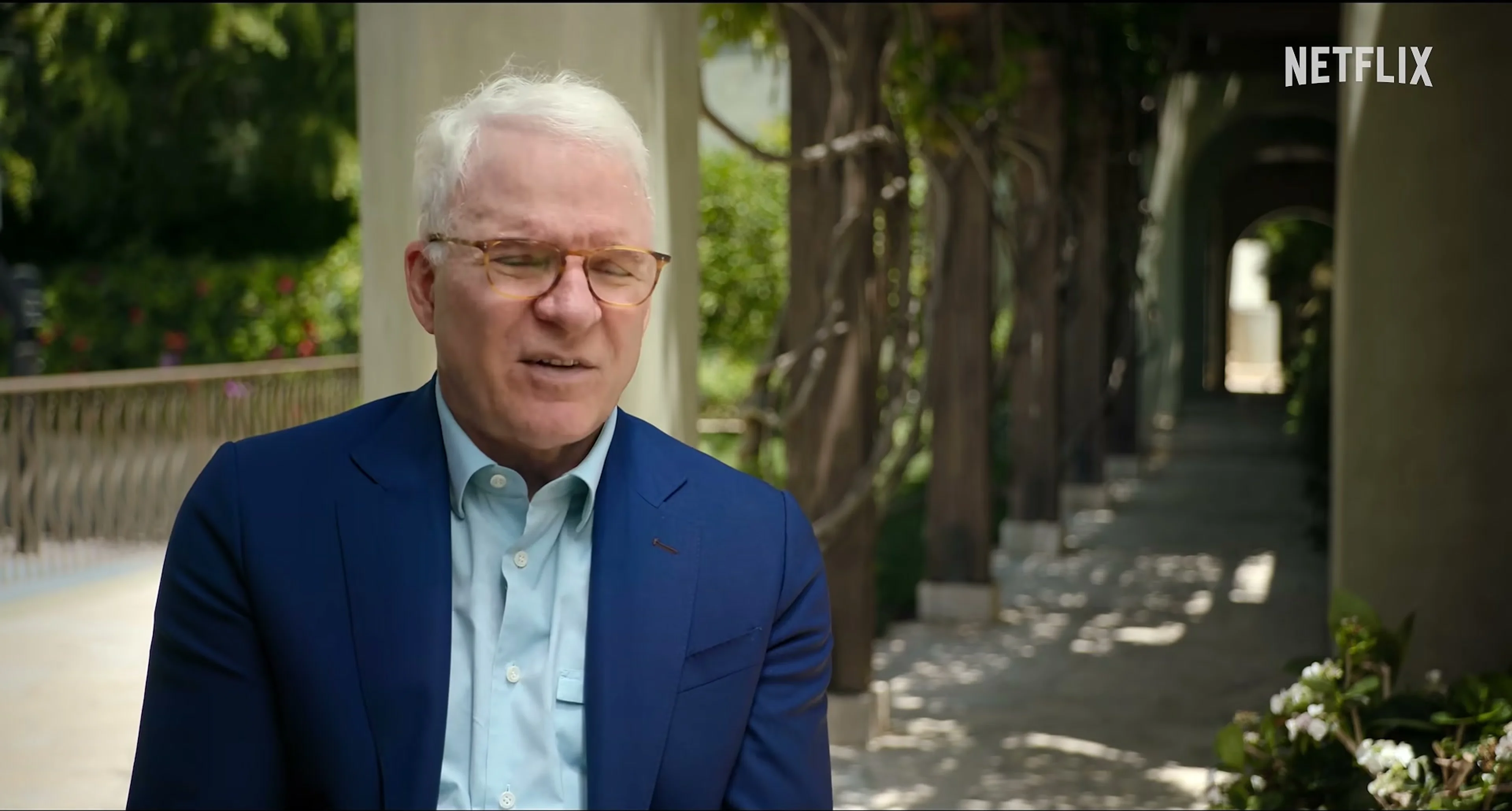 Steve Martin speaks outdoors in the Netflix documentary